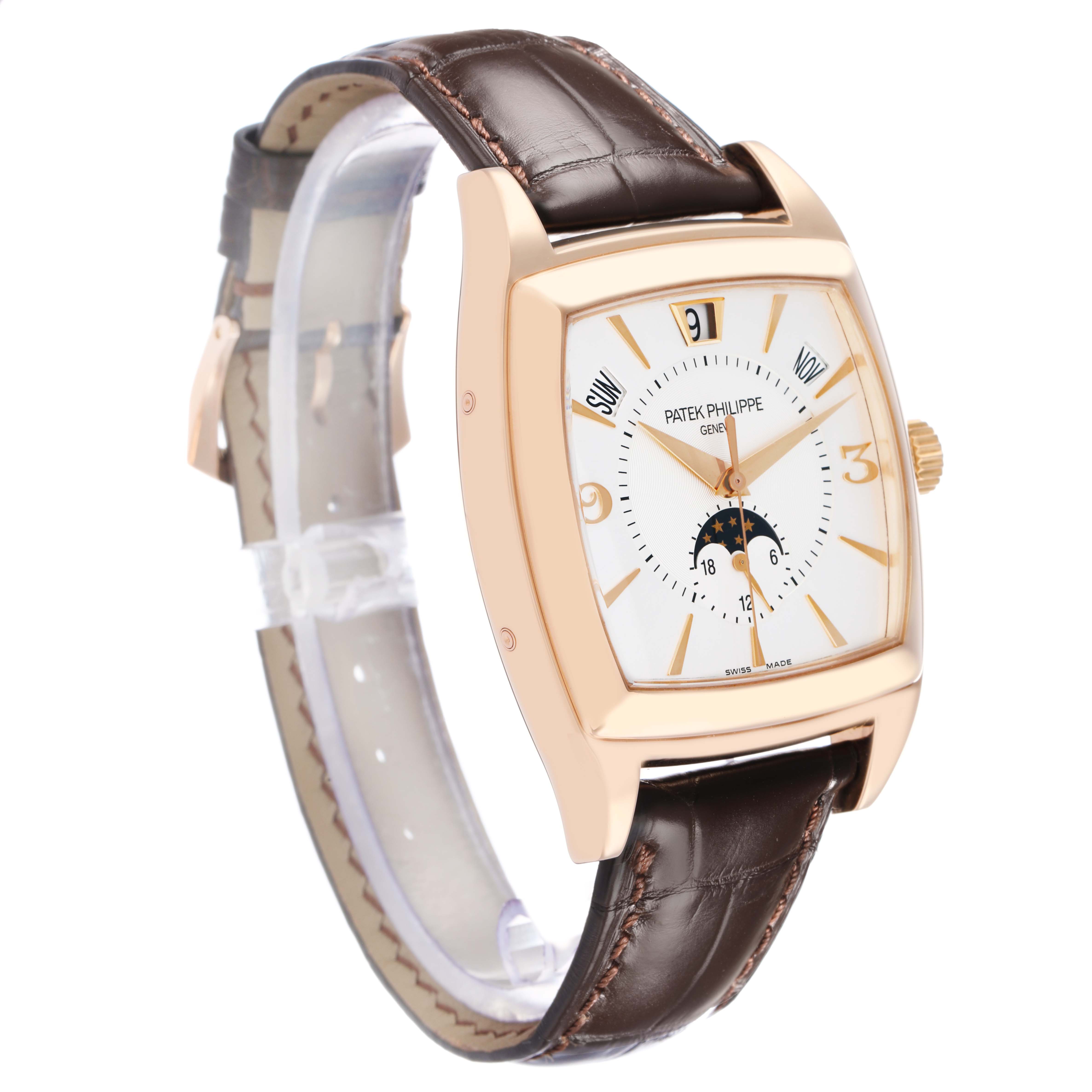 The Patek Philippe Gondolo 5135R-001 Men
s Rose Gold White Dial watch is shown at a three-quarter angle, highlighting its face, case, crown, and leather strap.