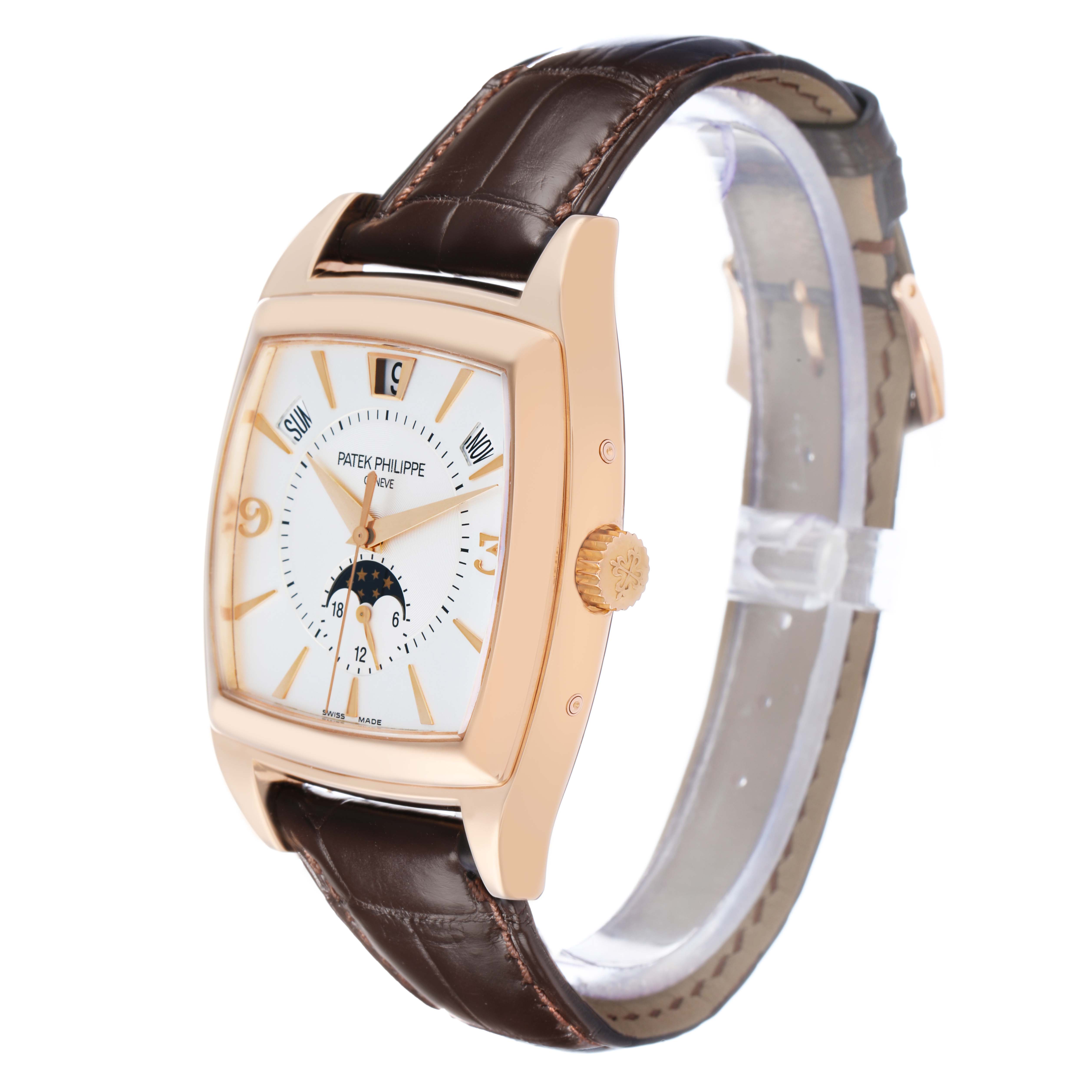 The Patek Philippe Gondolo 5135R-001 Men
s Rose Gold White Dial watch is shown at a three-quarter angle, highlighting its dial, crown, and leather strap.