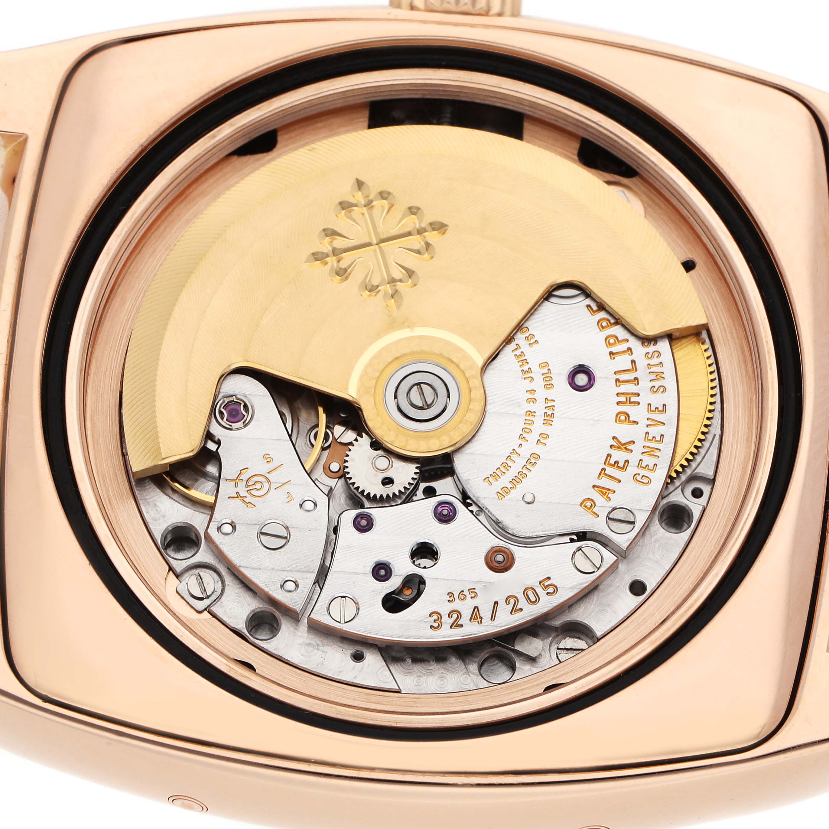 The image shows the back view of a Patek Philippe Gondolo 5135R-001 Men
s Rose Gold White Dial watch, highlighting the intricate movement and rotor.