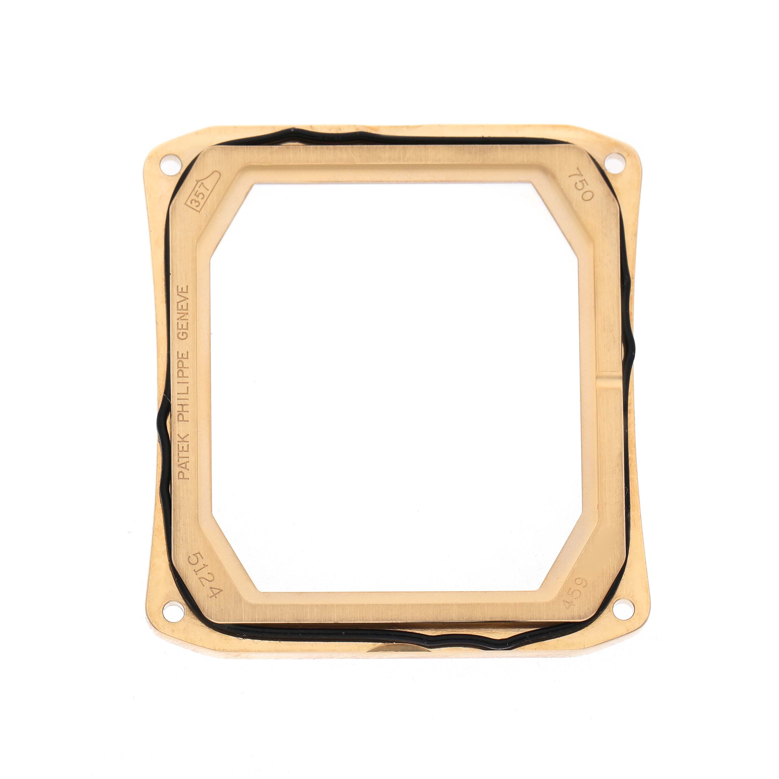 The image shows a rectangular gold case frame for a Patek Philippe Gondolo 5124J-001 Men's Yellow Gold Silver Dial watch, viewed from above.