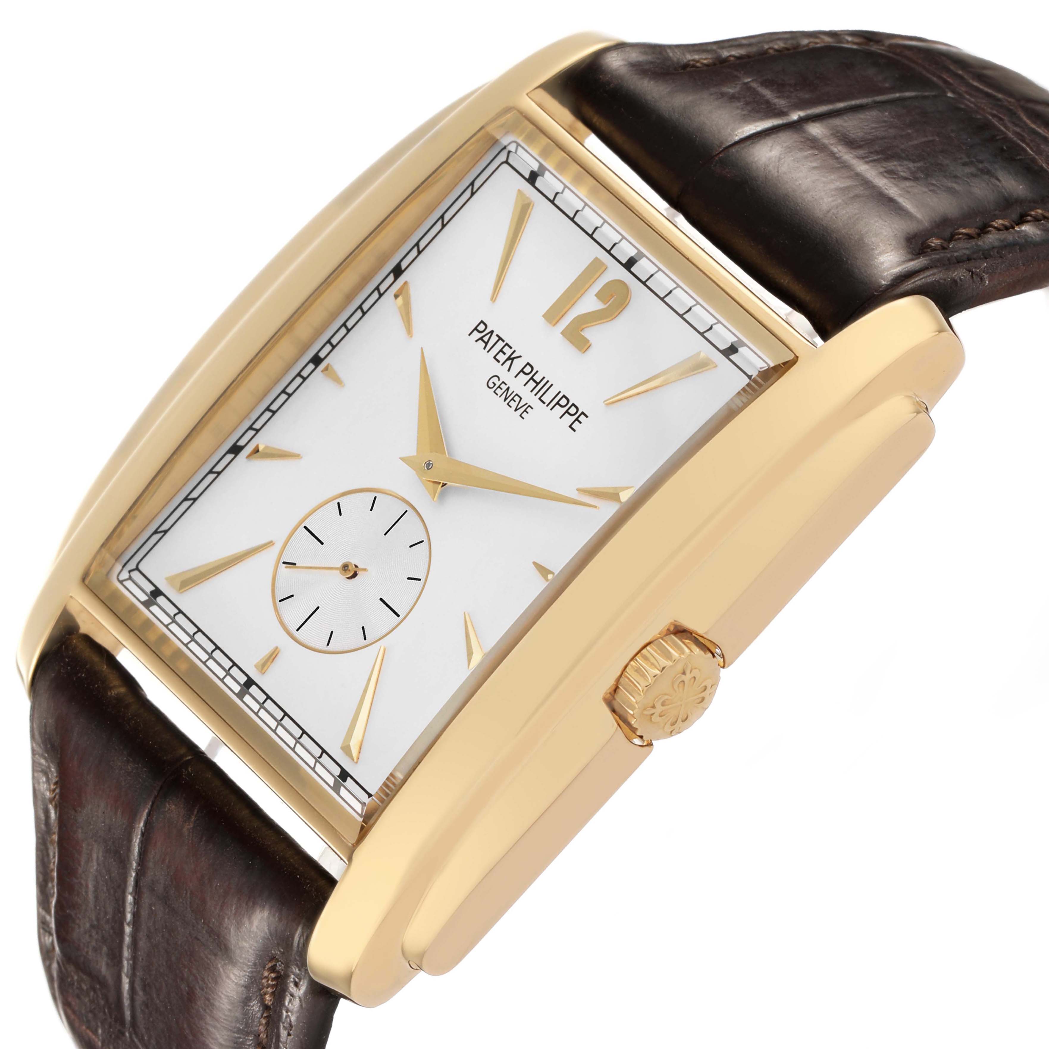 The Patek Philippe Gondolo 5124J-001 Men's Yellow Gold Silver Dial watch is shown in a three-quarter angle highlighting the dial, crown, case, and strap.