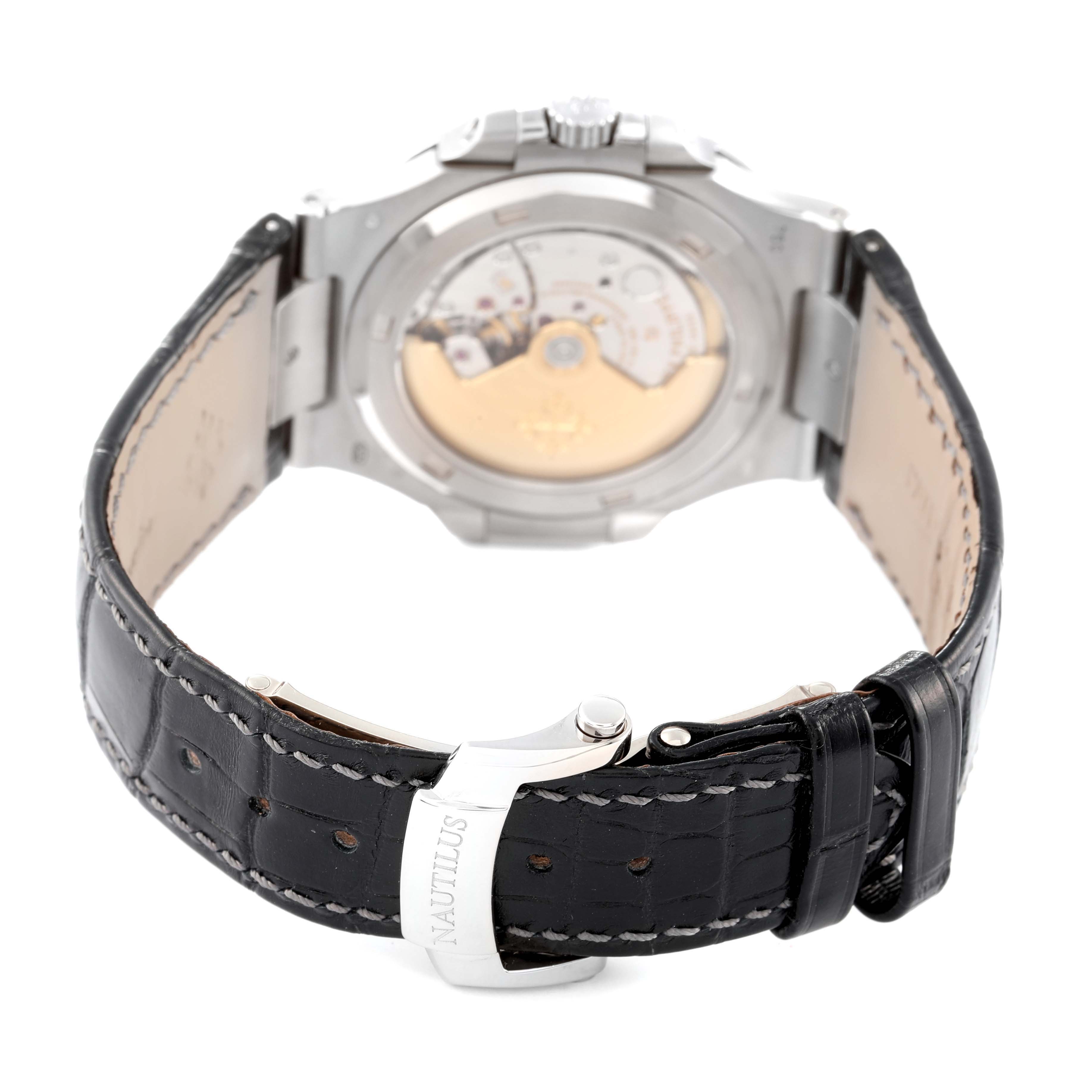 The image shows the back view of a Patek Philippe Nautilus 5711G-001 Men's White Gold Grey Dial 5711G-001 Men's White Gold Grey Dial watch, highlighting its strap, buckle, and movement.