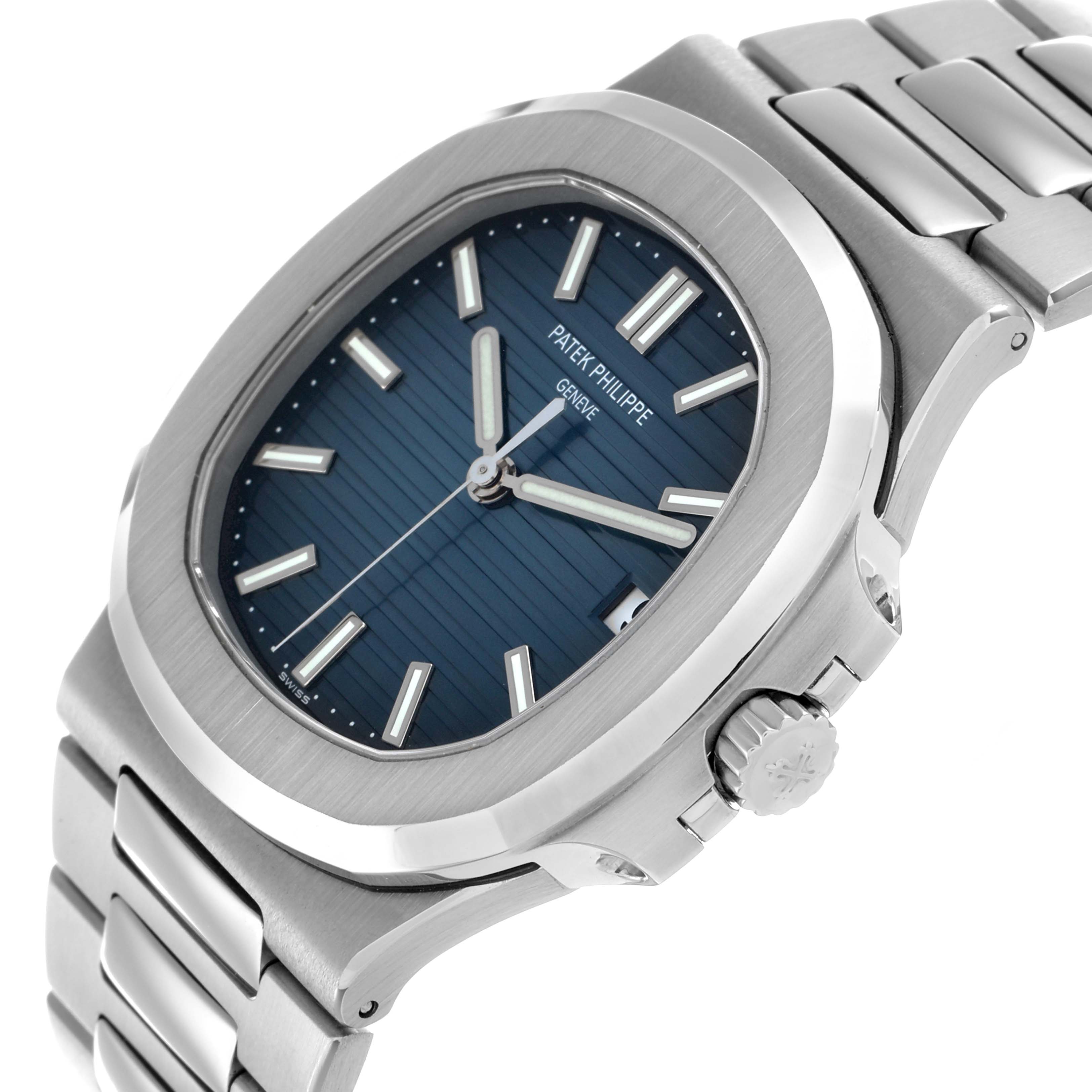 The image shows a side angle of the Patek Philippe Nautilus 5711/1A-010 Men
s Stainless Steel Blue Dial watch, highlighting the dial, bezel, crown, and bracelet.