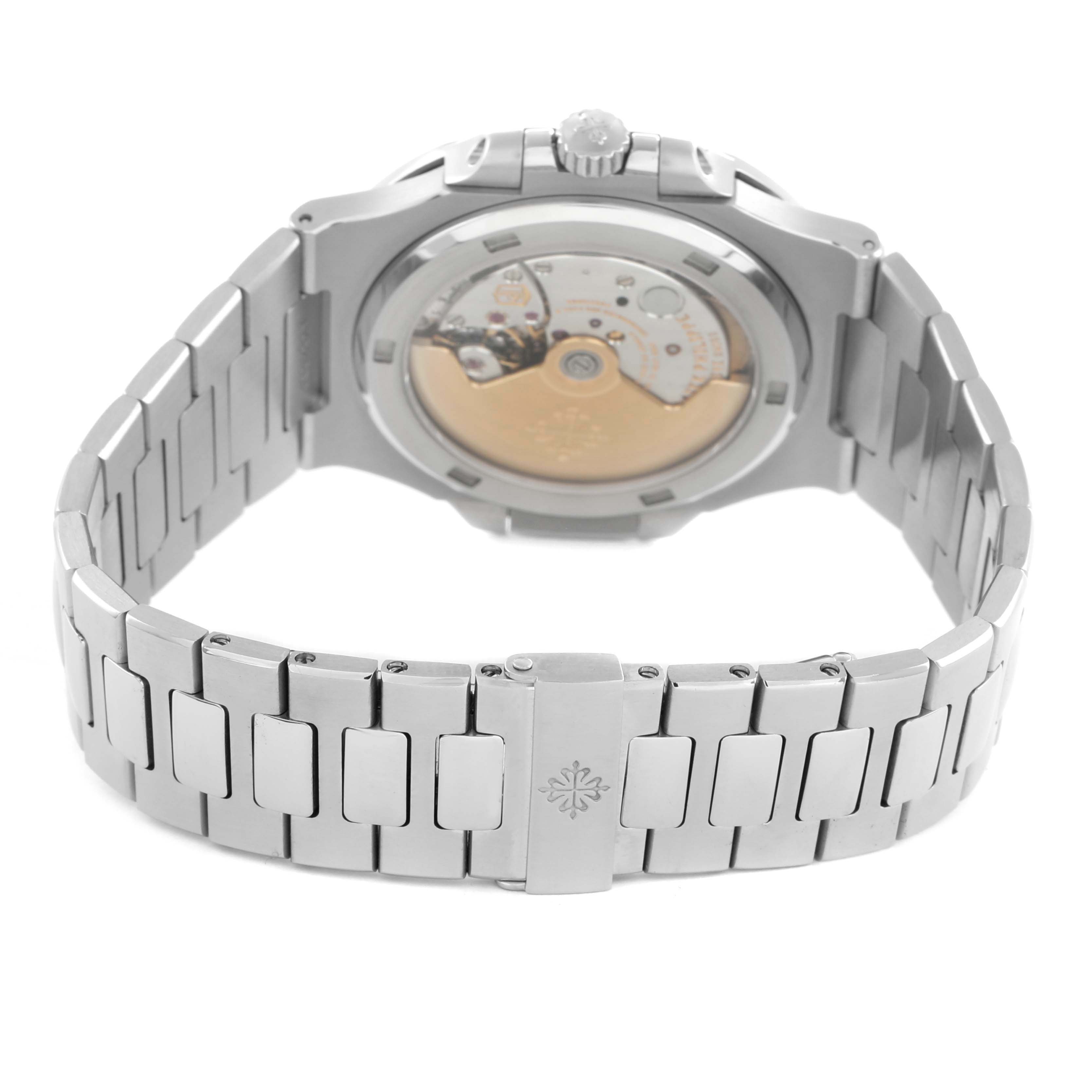 The image shows the back of a Patek Philippe Nautilus 5711/1A-010 Men
s Stainless Steel Blue Dial watch, highlighting its open case back and bracelet.