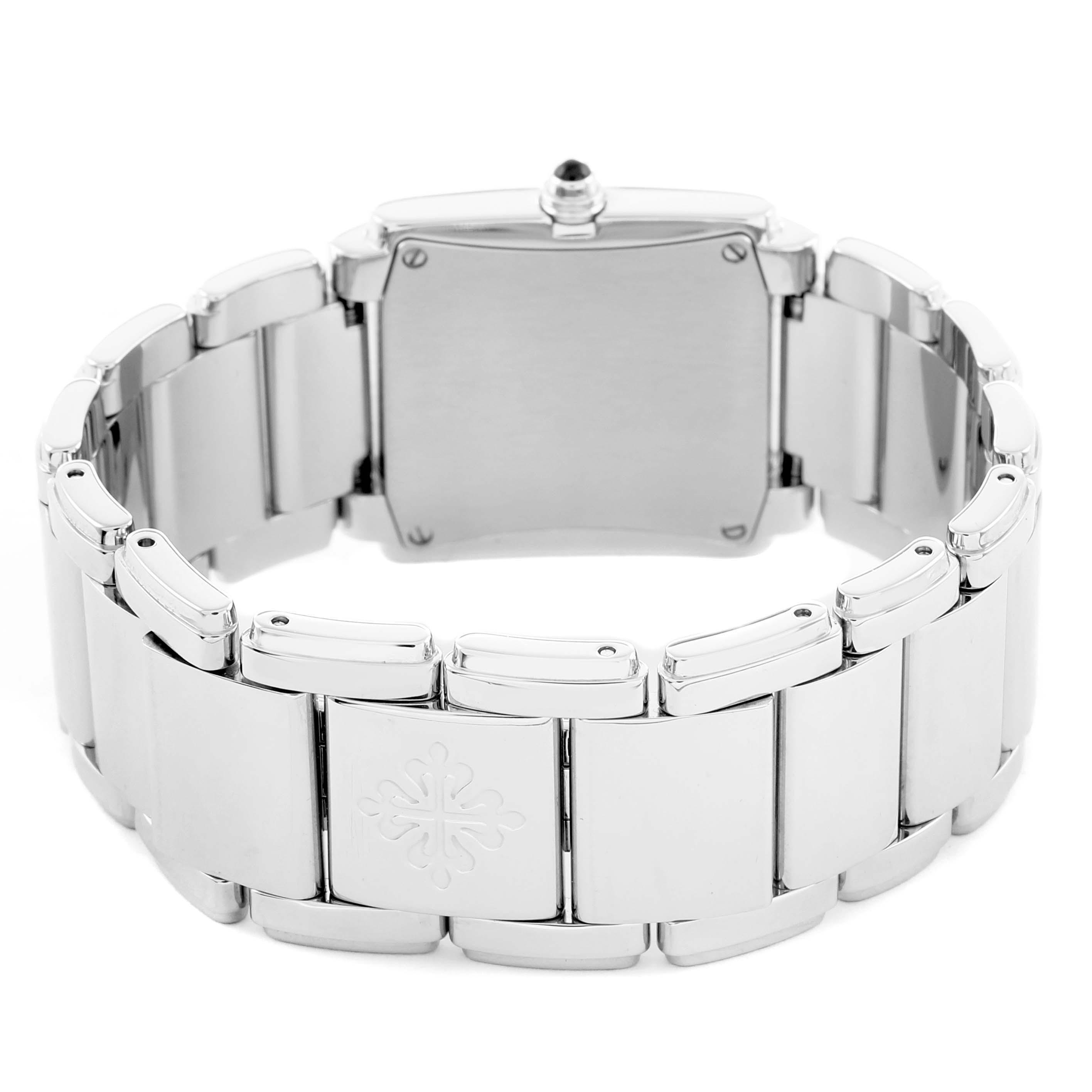 The image shows the back view of a Patek Philippe Twenty-4 4910 Women
s Stainless Steel Black Dial watch, highlighting the bracelet and closed case back.