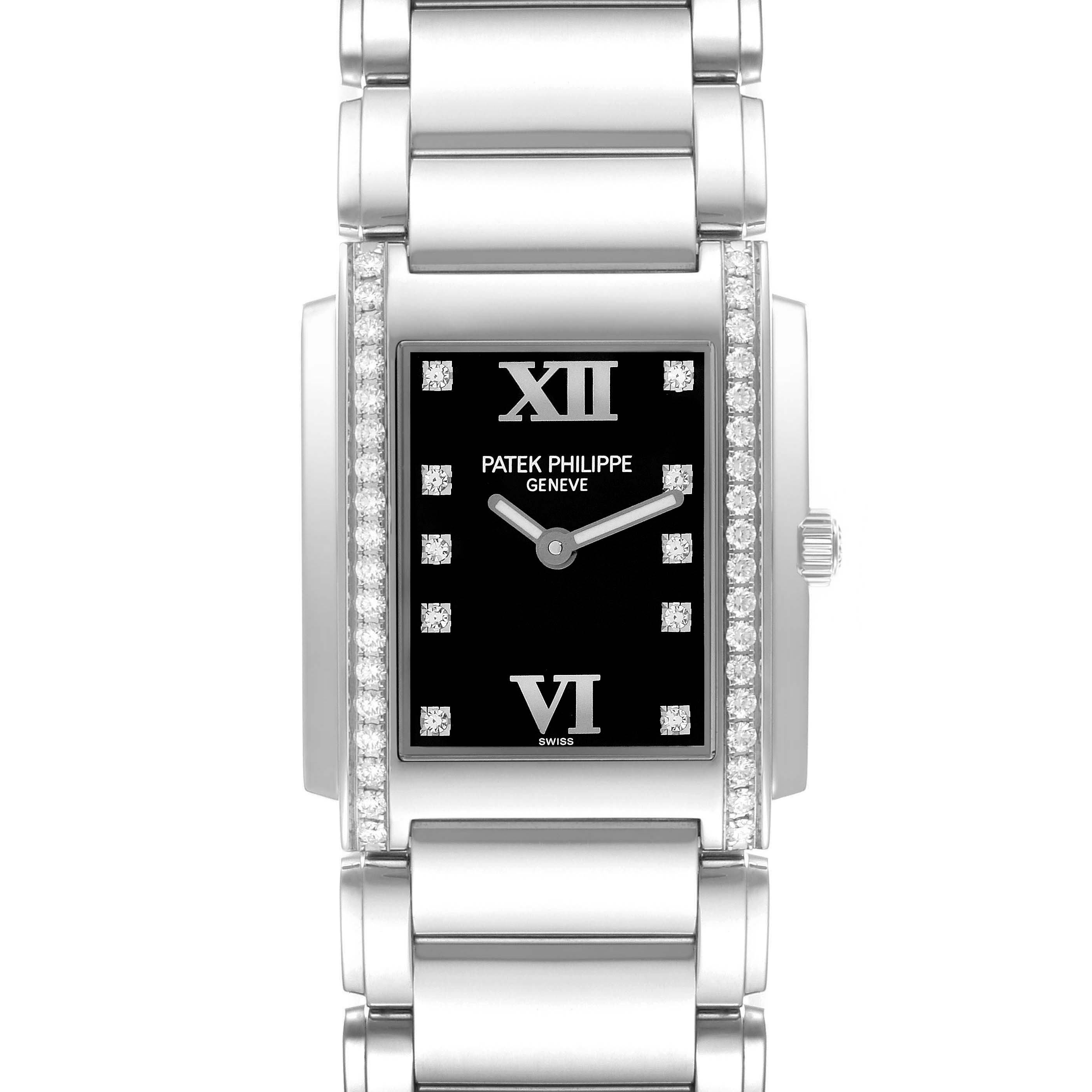 The Patek Philippe Twenty-4 4910 Women
s Stainless Steel Black Dial watch is shown from a front angle, highlighting its rectangular face, diamonds, and metal bracelet.