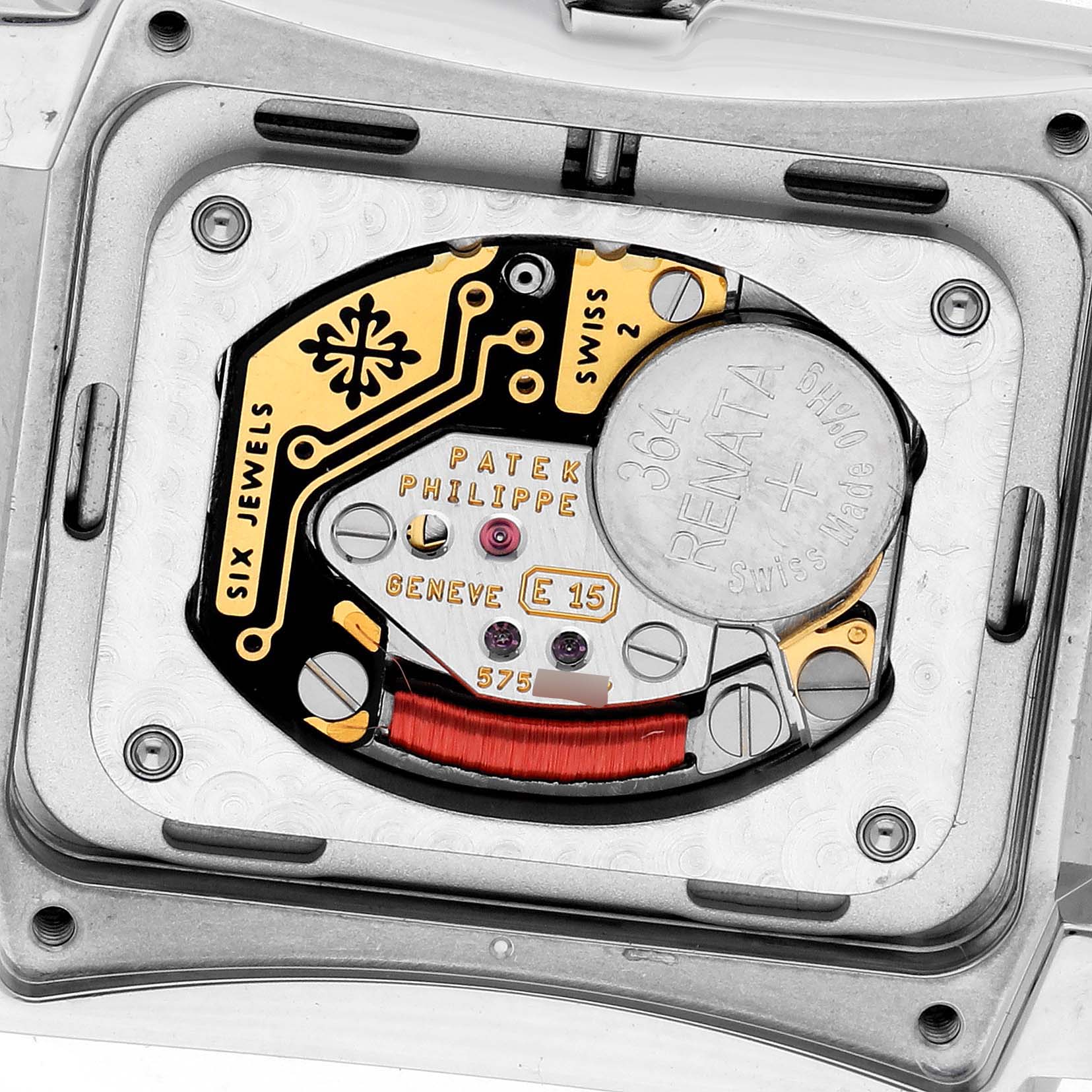 The image shows the movement of a Patek Philippe Twenty-4 4910/10A-010 Women's Stainless Steel Silver Dial watch from a back angle, highlighting its battery and internal components.