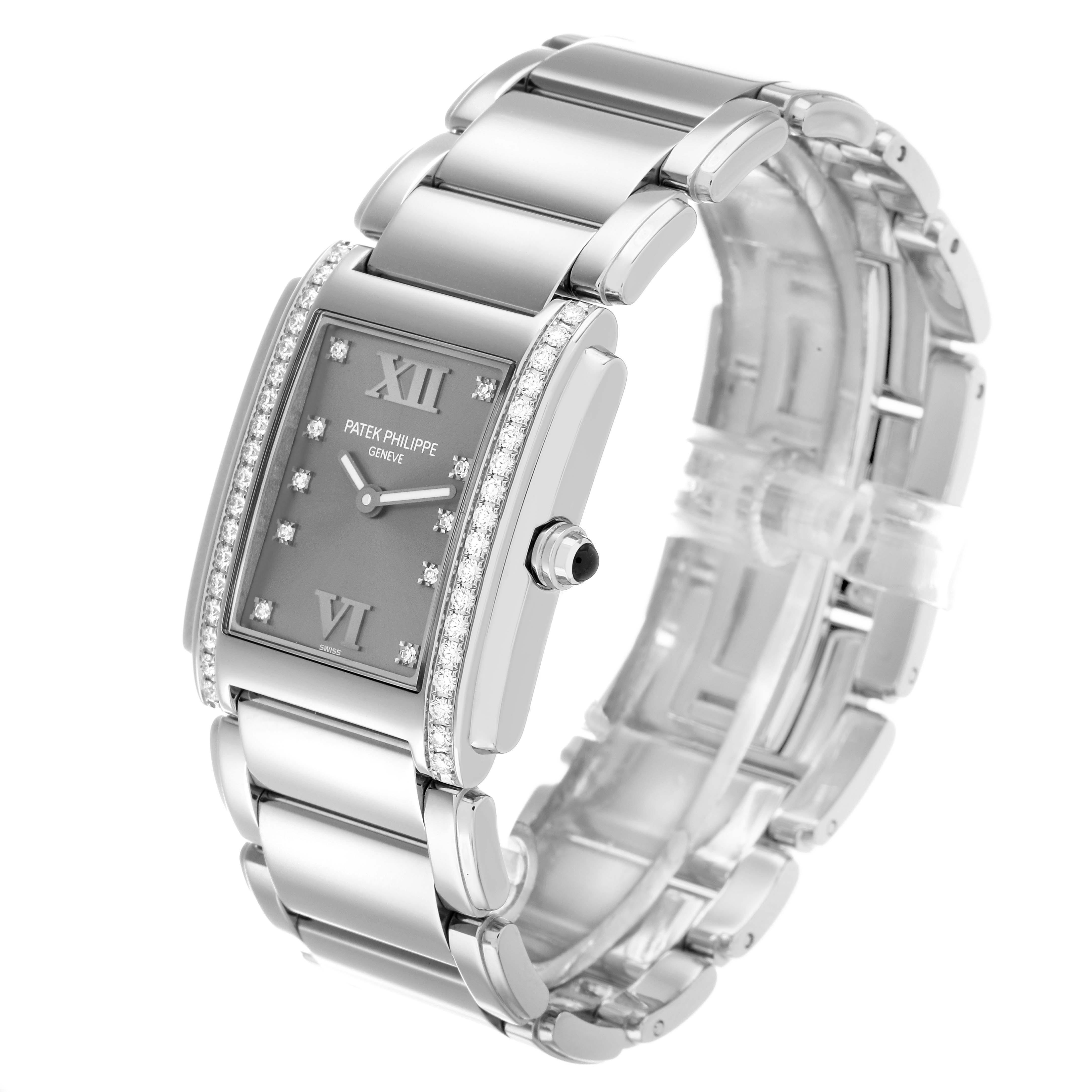 The Patek Philippe Twenty-4 4910/10A-010 Women's Stainless Steel Silver Dial watch is shown at a three-quarter angle, displaying the case, bezel, dial, and bracelet.