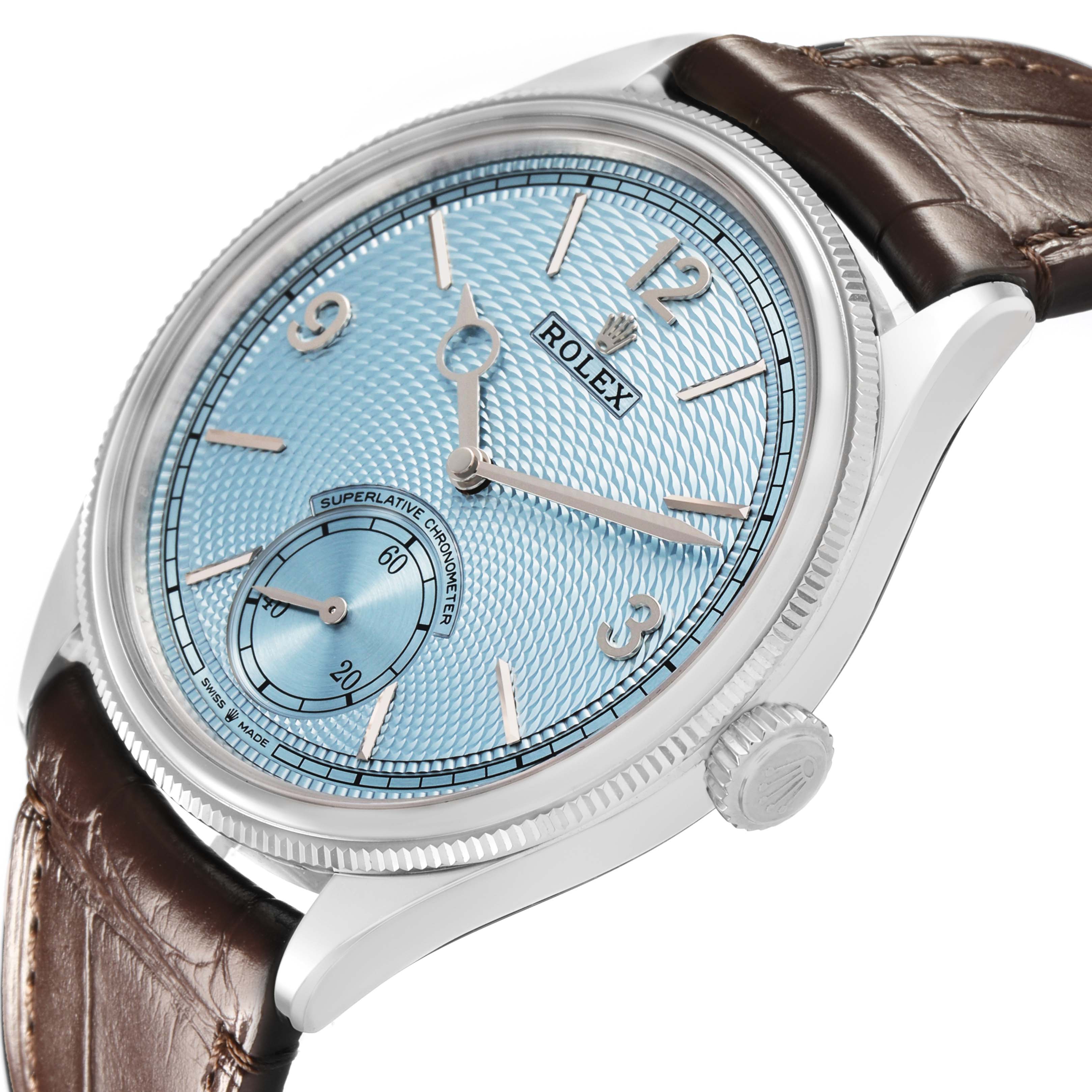 The Rolex 1908 52506 Men's Platinum Blue Dial model is shown at an angled view, highlighting its blue textured dial, silver markers, and brown leather strap.