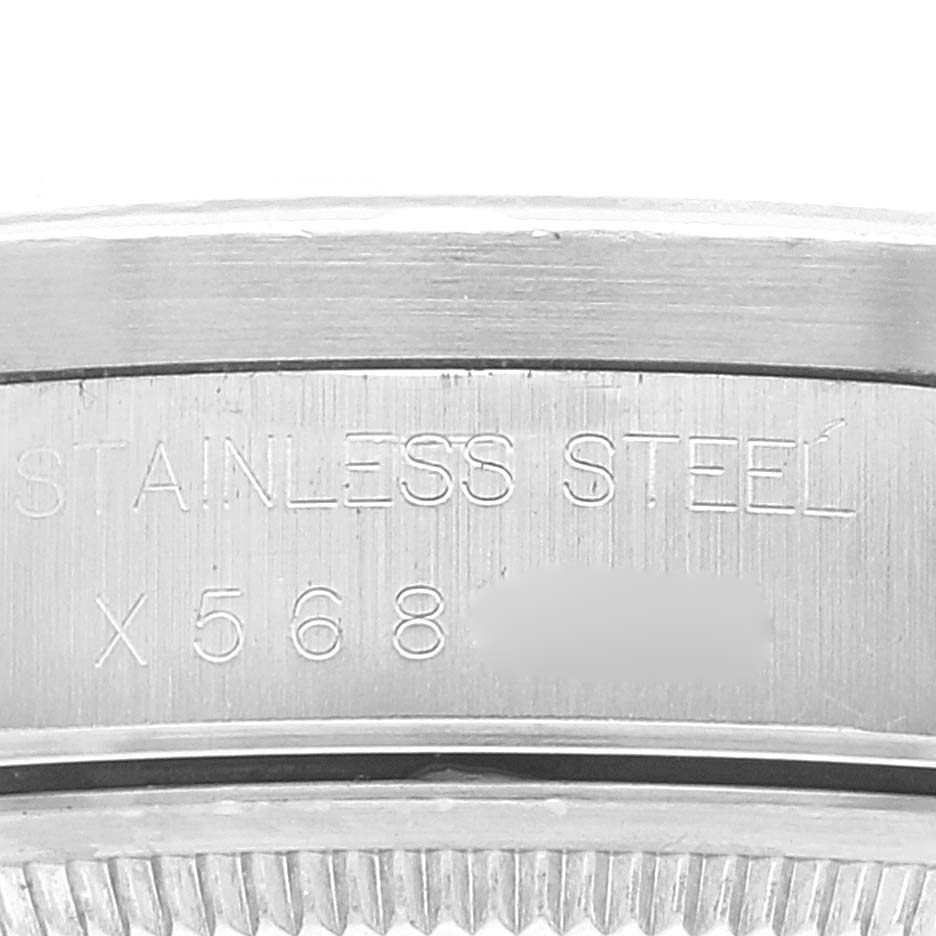 The image shows a close-up of the side engraving on the stainless steel case of a Rolex Air-King 14010 Men's Stainless Steel Silver Dial 14010 Men's Stainless Steel Silver Dial watch.