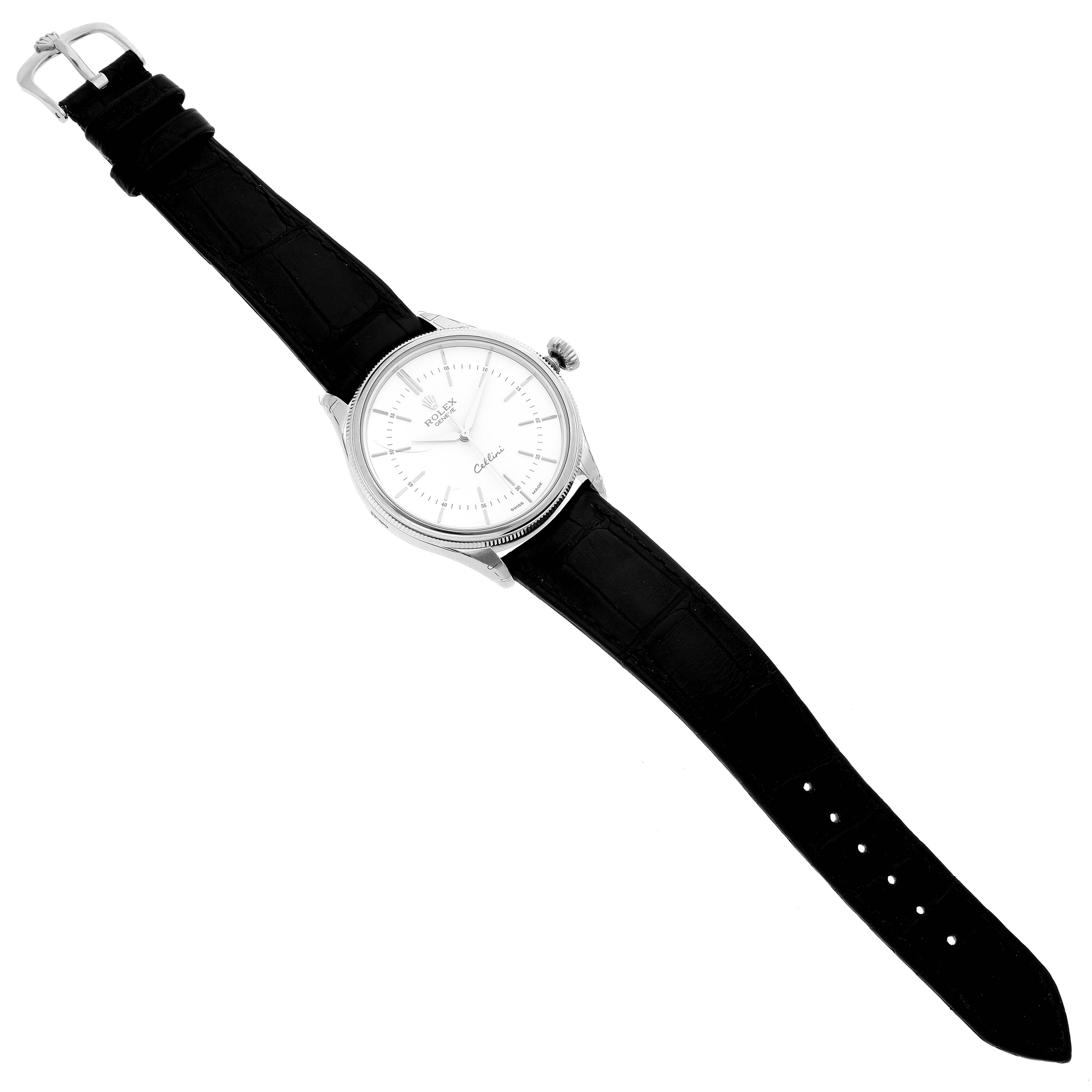 The Rolex Cellini 50509 Men's White Gold White Dial 50509 Men's White Gold White Dial watch is shown from a top-down angle, displaying the face, bezel, crown, and entire leather strap.