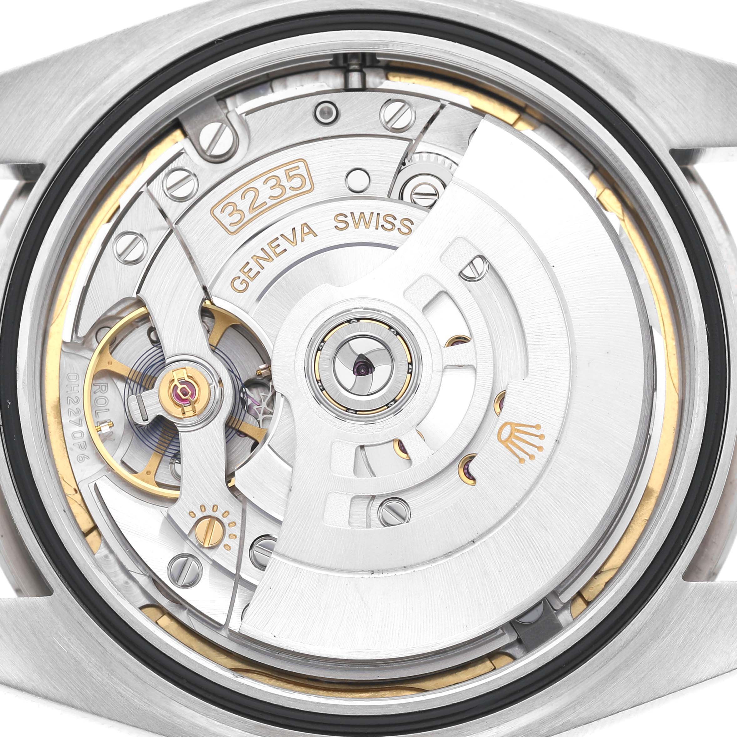 This image shows the movement of a Rolex Datejust 41 126334 Men's Stainless Steel Blue Dial from a top-down angle, revealing its intricate mechanical components.