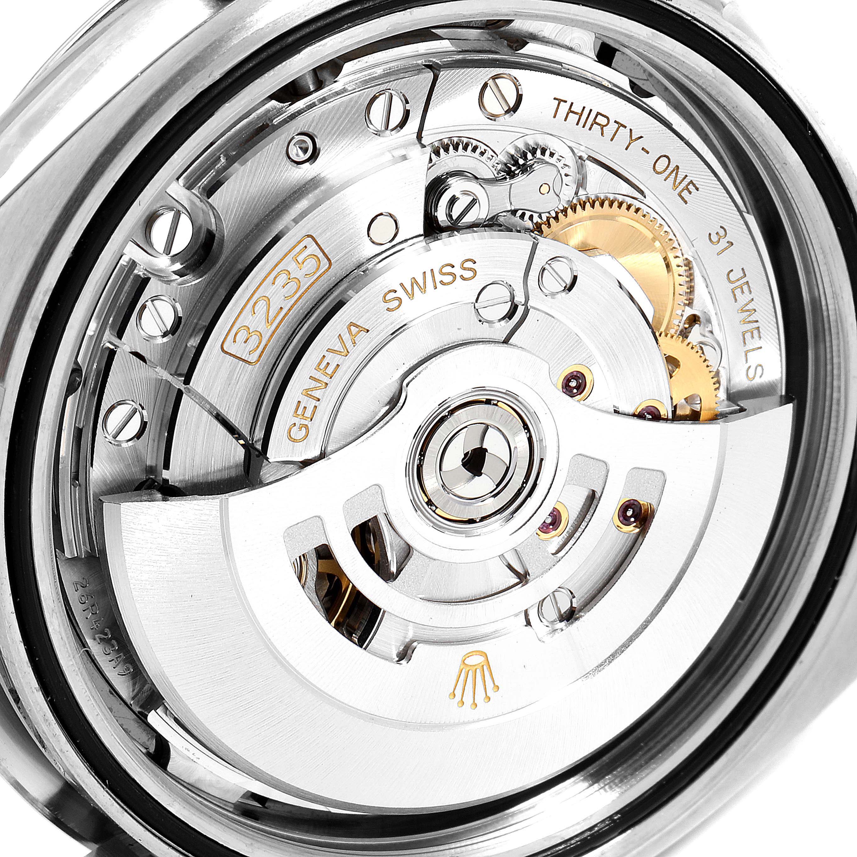 This is a close-up view of the movement mechanism inside a Rolex Datejust 41 126334 Men's Stainless Steel Grey Dial 126334 Men's Stainless Steel Grey Dial watch, showcasing the intricate internal components.