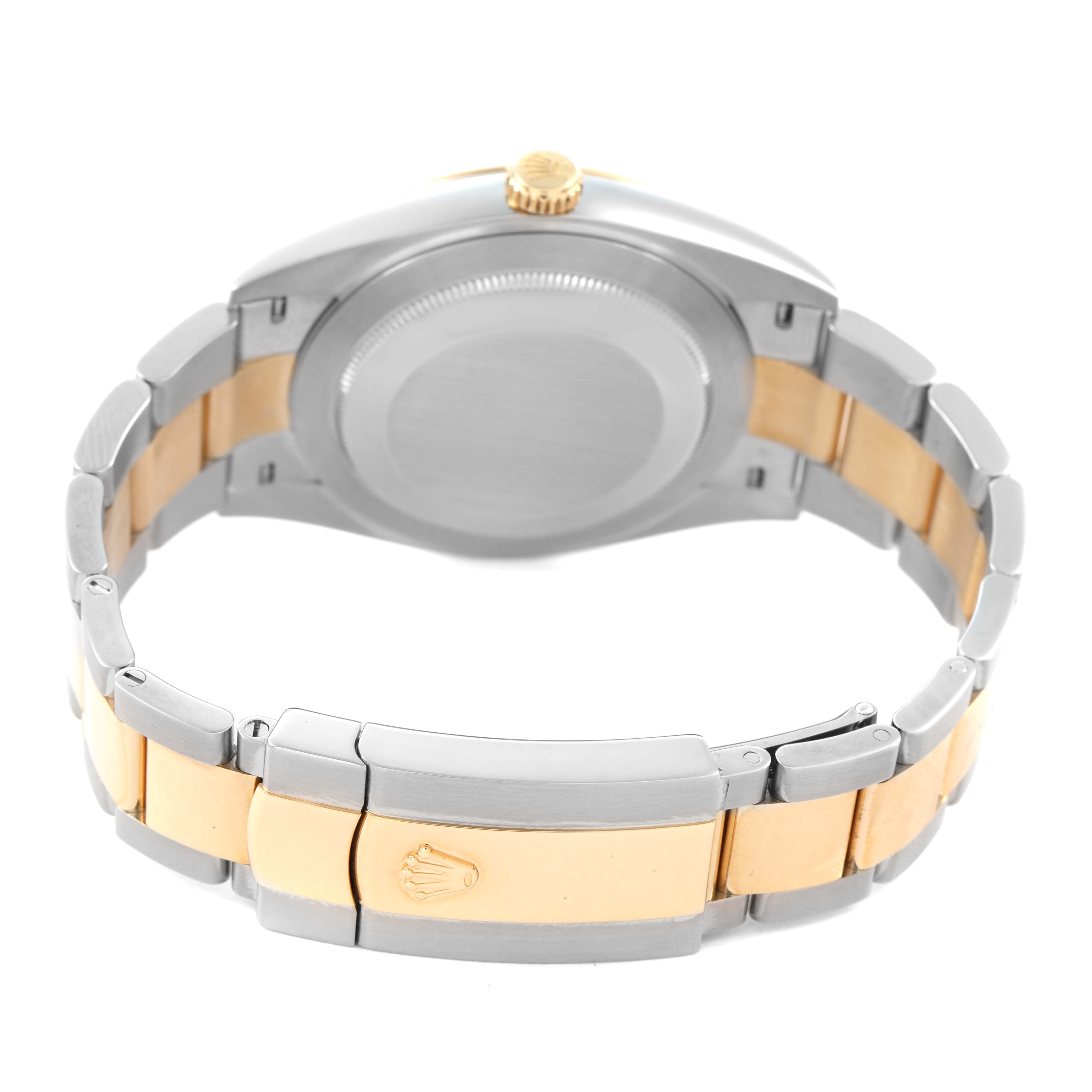 The image shows the back view of a Rolex Datejust 41 126303 Men's Steel and Gold (two tone) Black Dial, highlighting the case back and two-tone bracelet with the Rolex crown on the clasp.