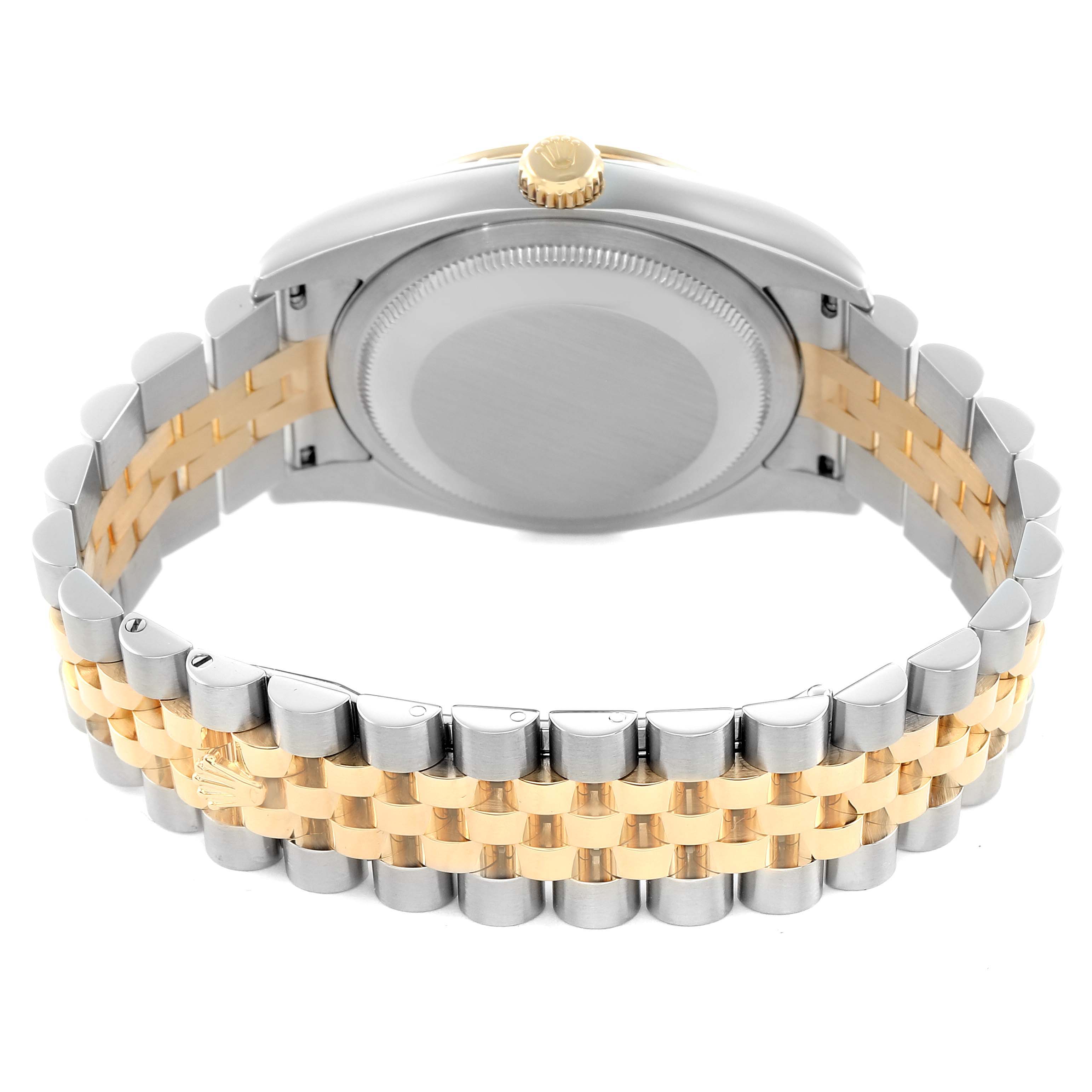 The image shows the back case and two-tone bracelet of a Rolex Datejust 116243 Men's Steel and Gold (two tone) Black Dial watch from a rear angle.