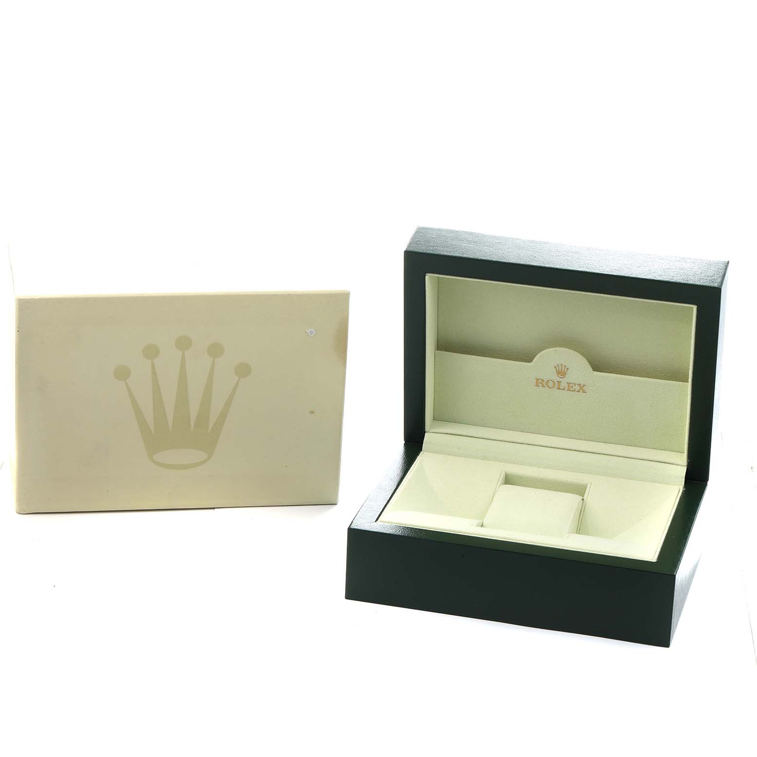 The image shows the open box and outer covering for a Rolex Datejust 116243 Men's Steel and Gold (two tone) Black Dial watch, presenting an interior slot for the watch.