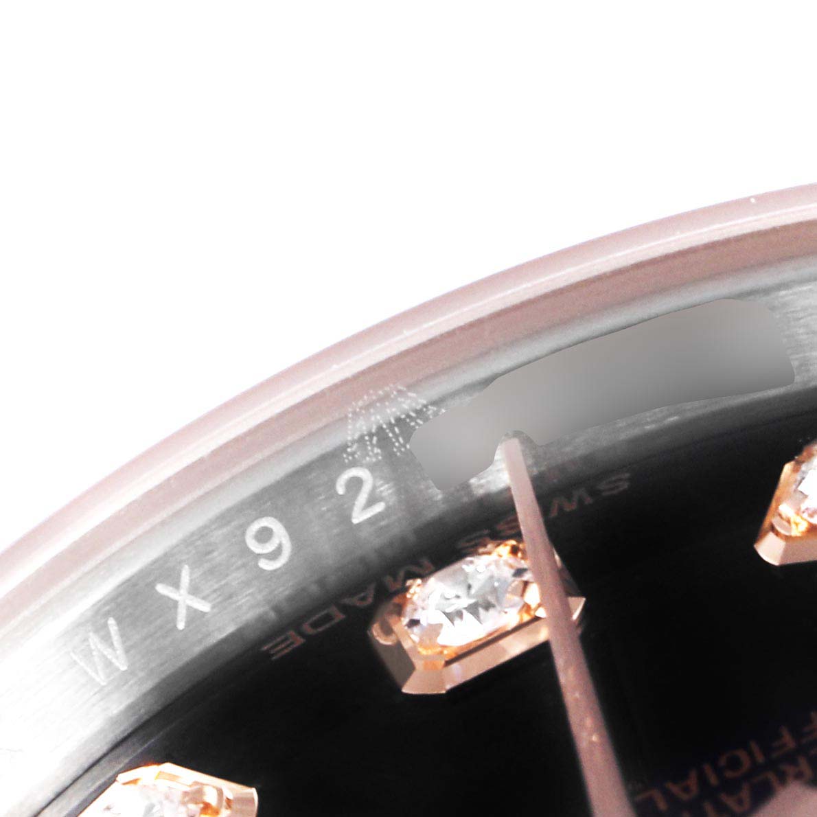 The image shows a close-up of the dial edge and jewel markers of a Rolex Datejust 179171 Women's Rose Gold Black Dial 179171 Women's Rose Gold Black Dial watch.