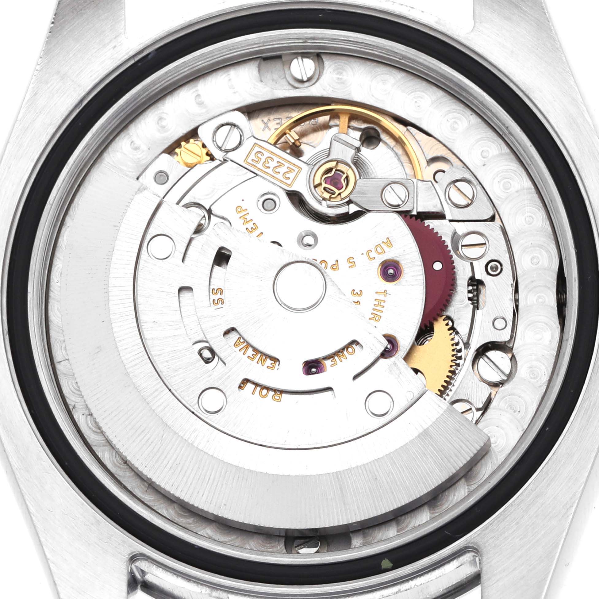 The image shows the movement of a Rolex Datejust 178240 Women's Stainless Steel Black Dial model from a back view highlighting its intricate mechanical components.