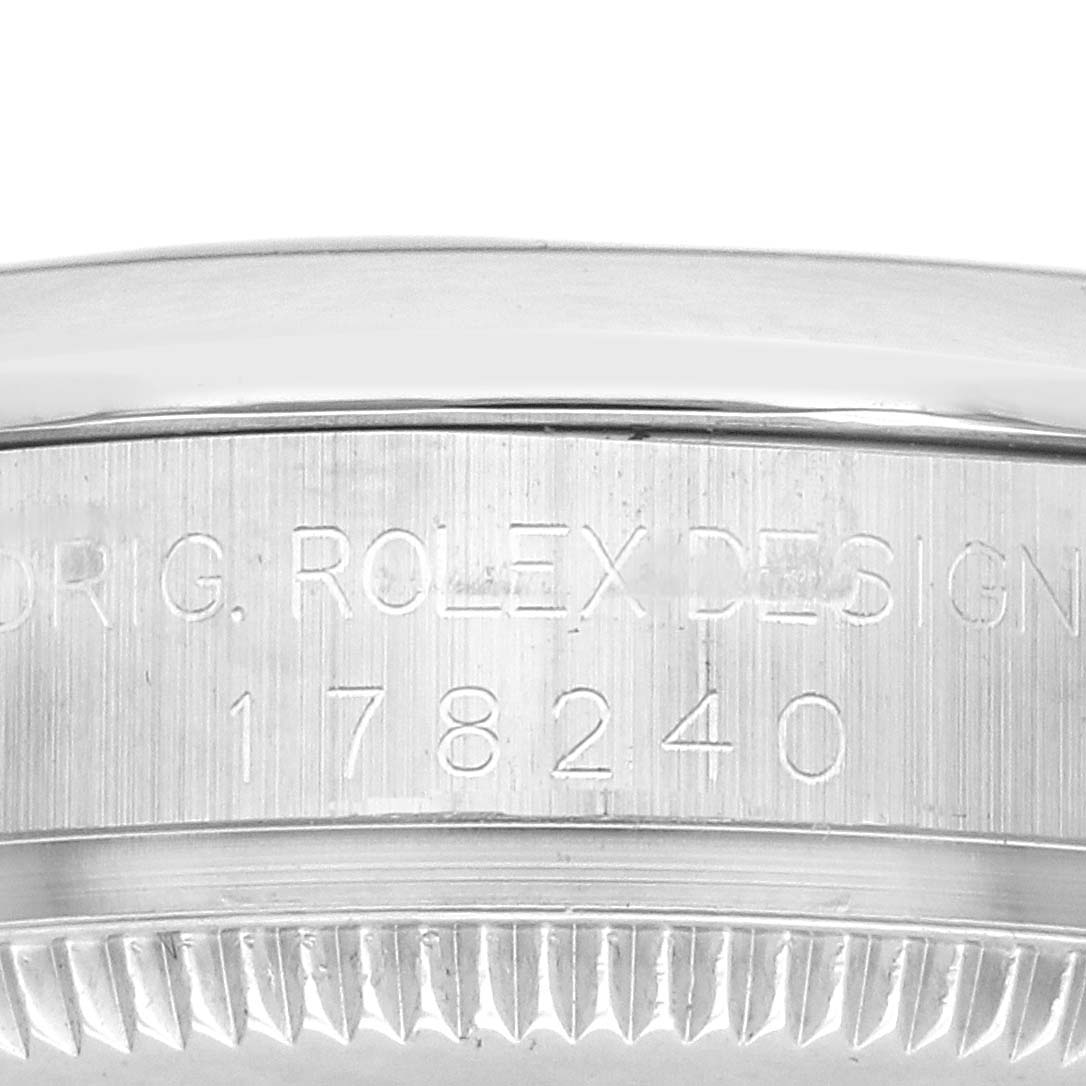 The image shows a close-up of the side of a Rolex Datejust 178240 Women's Stainless Steel Black Dial case with the engraving "ORIG. ROLEX DESIGN 178240".