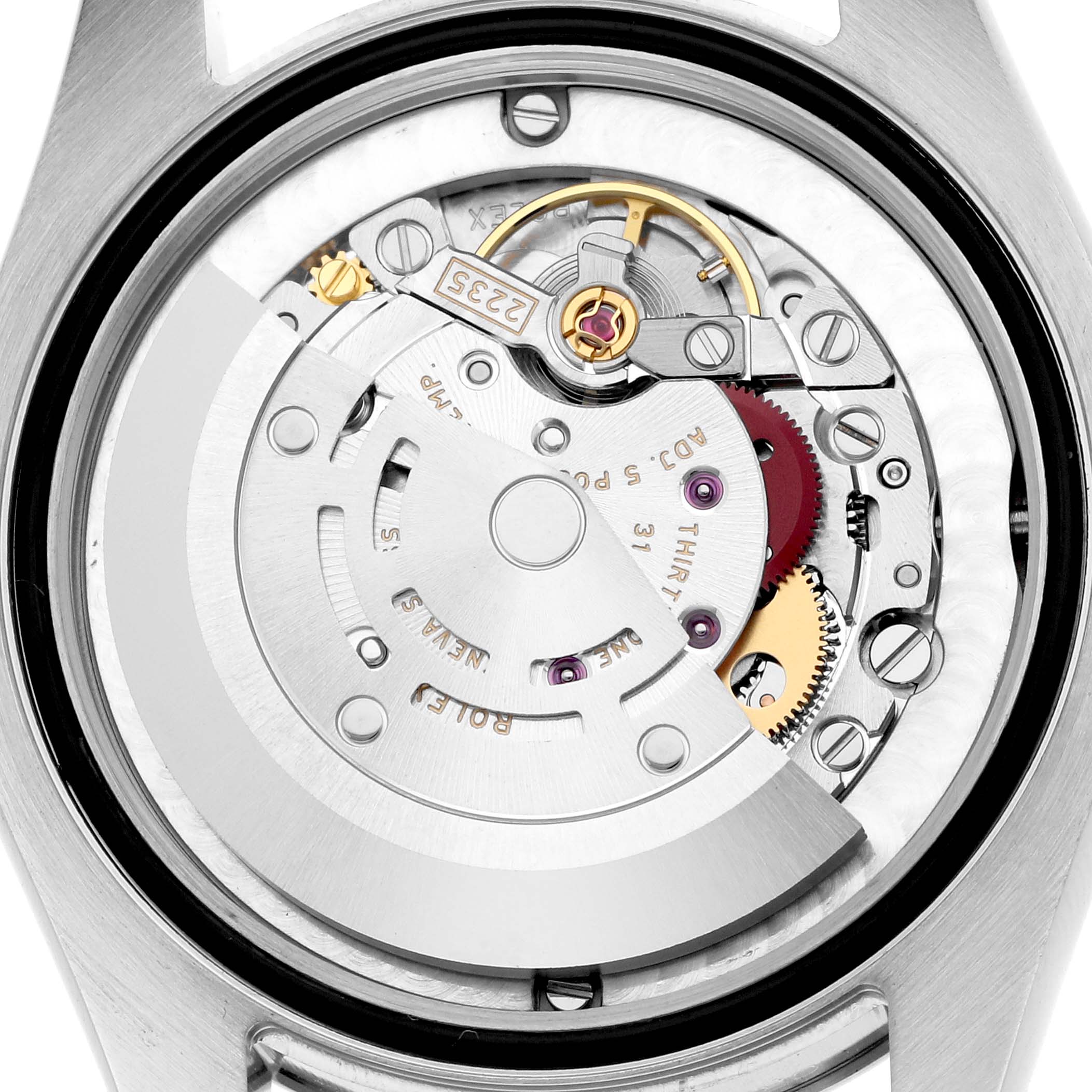 The image shows the movement of a Rolex Datejust 178274 Women's Stainless Steel White Dial watch from a rear angle, revealing gears and the rotor.