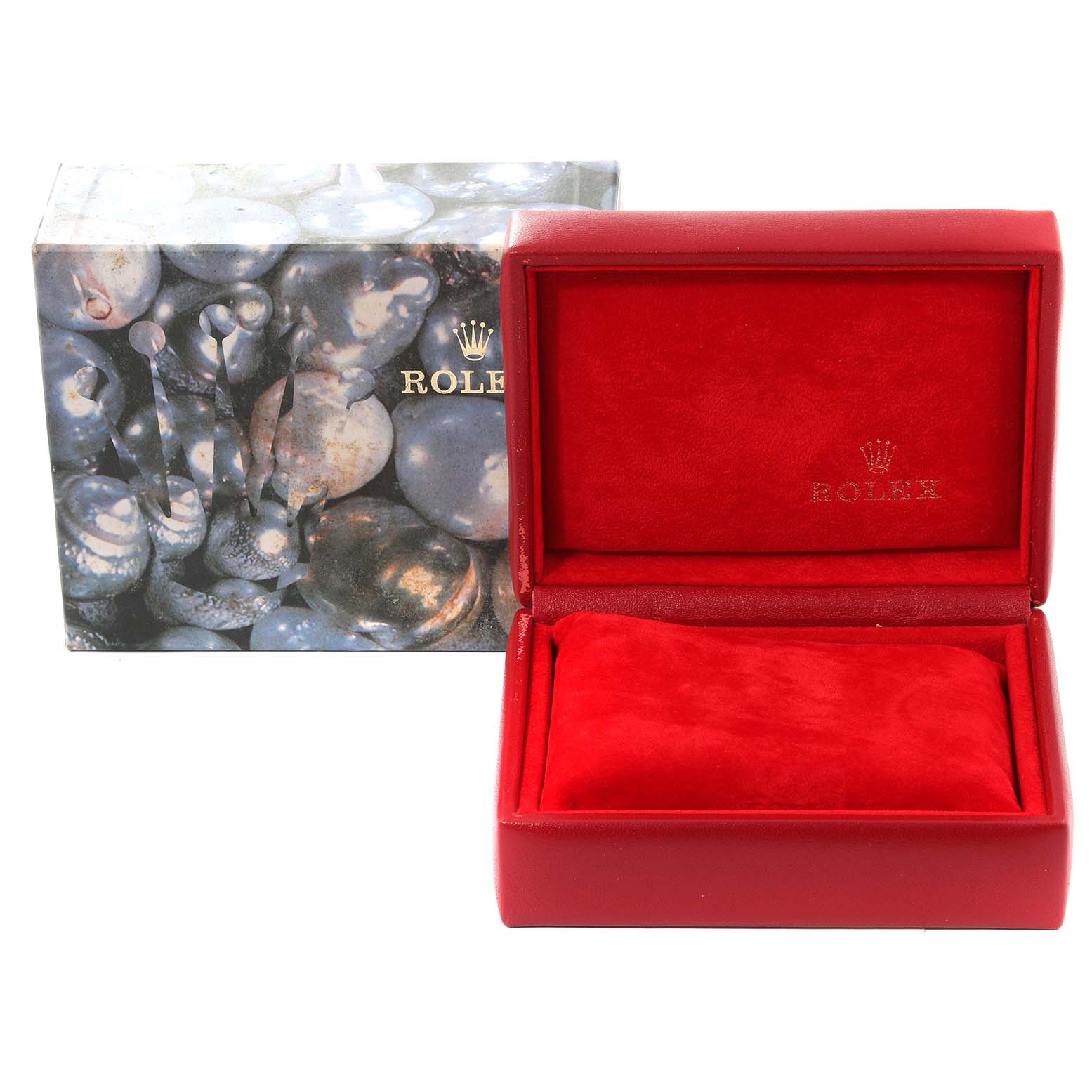 The image shows a Rolex Datejust 79174 Women's Stainless Steel Pink Dial 79174 Women's Stainless Steel Pink Dial watch box and cushion from an angled front view.