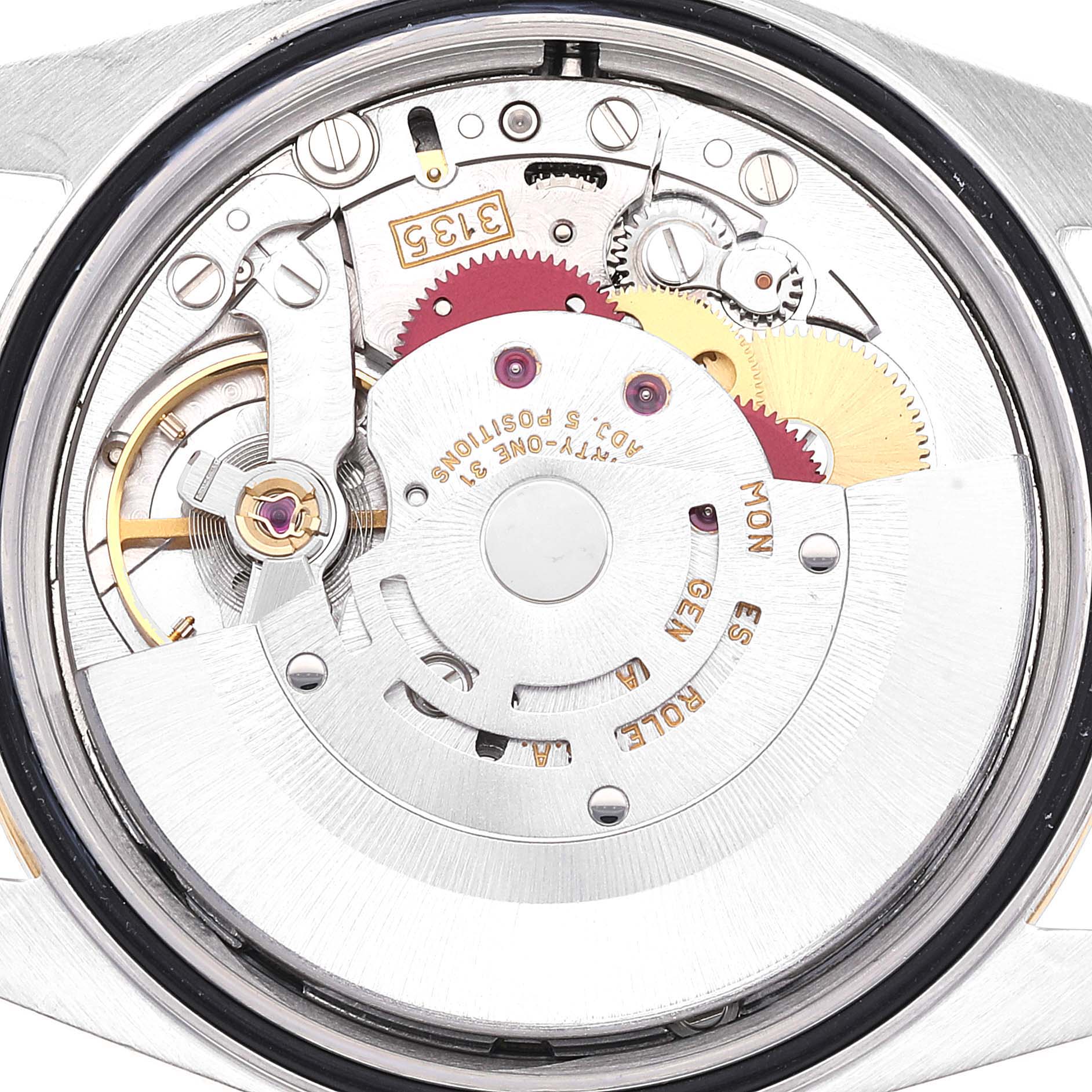 This image shows the intricate inner mechanics and movement of a Rolex Datejust 16233 Men's Steel and Gold (two tone) Blue Dial 16233 Men's Steel and Gold (two tone) Blue Dial model from a back angle.