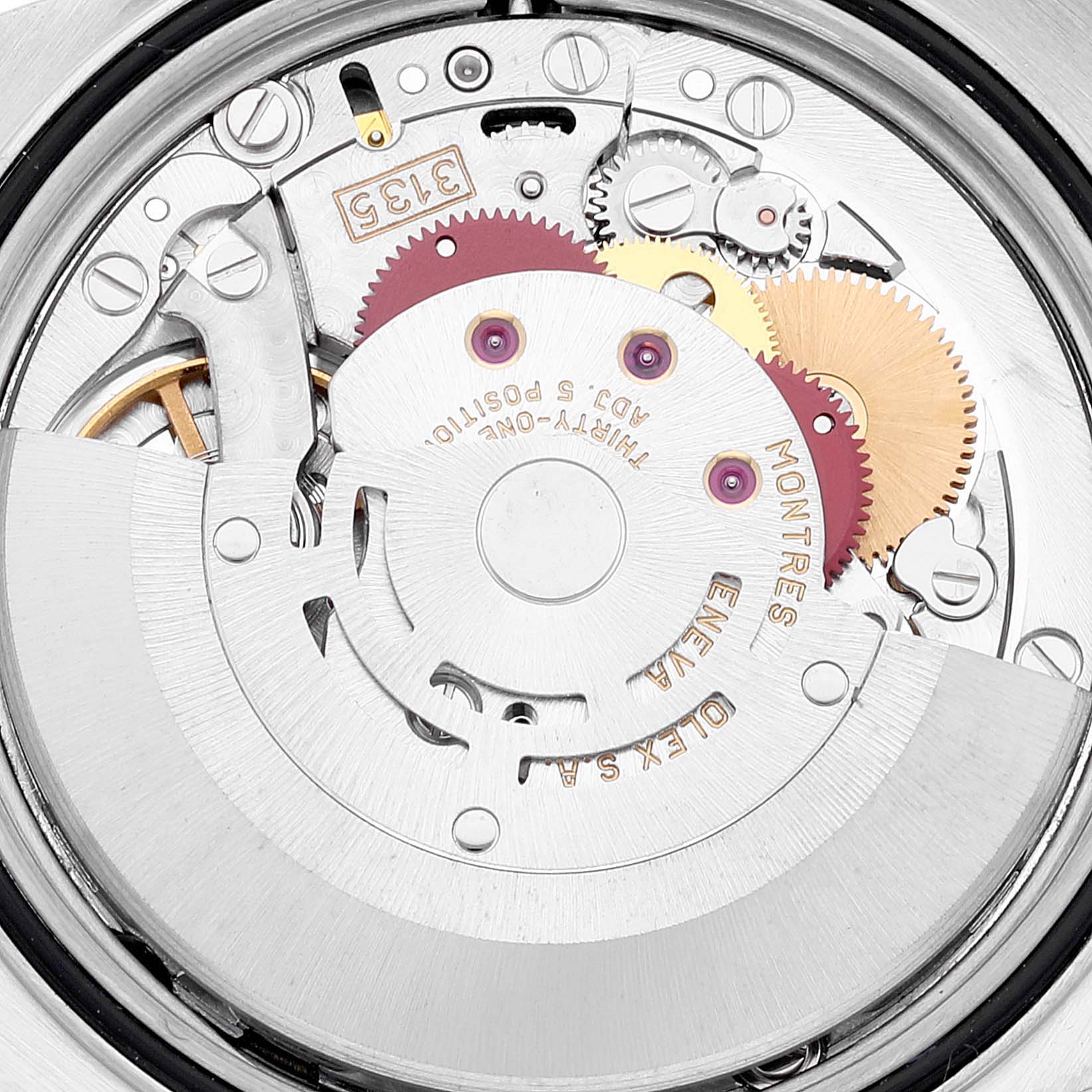 The image shows the internal mechanism and movement of the Rolex Datejust 16233 Men's Steel and Gold (two tone) Champagne Dial 16233 Men's Steel and Gold (two tone) Champagne Dial watch from a close-up, rear angle.