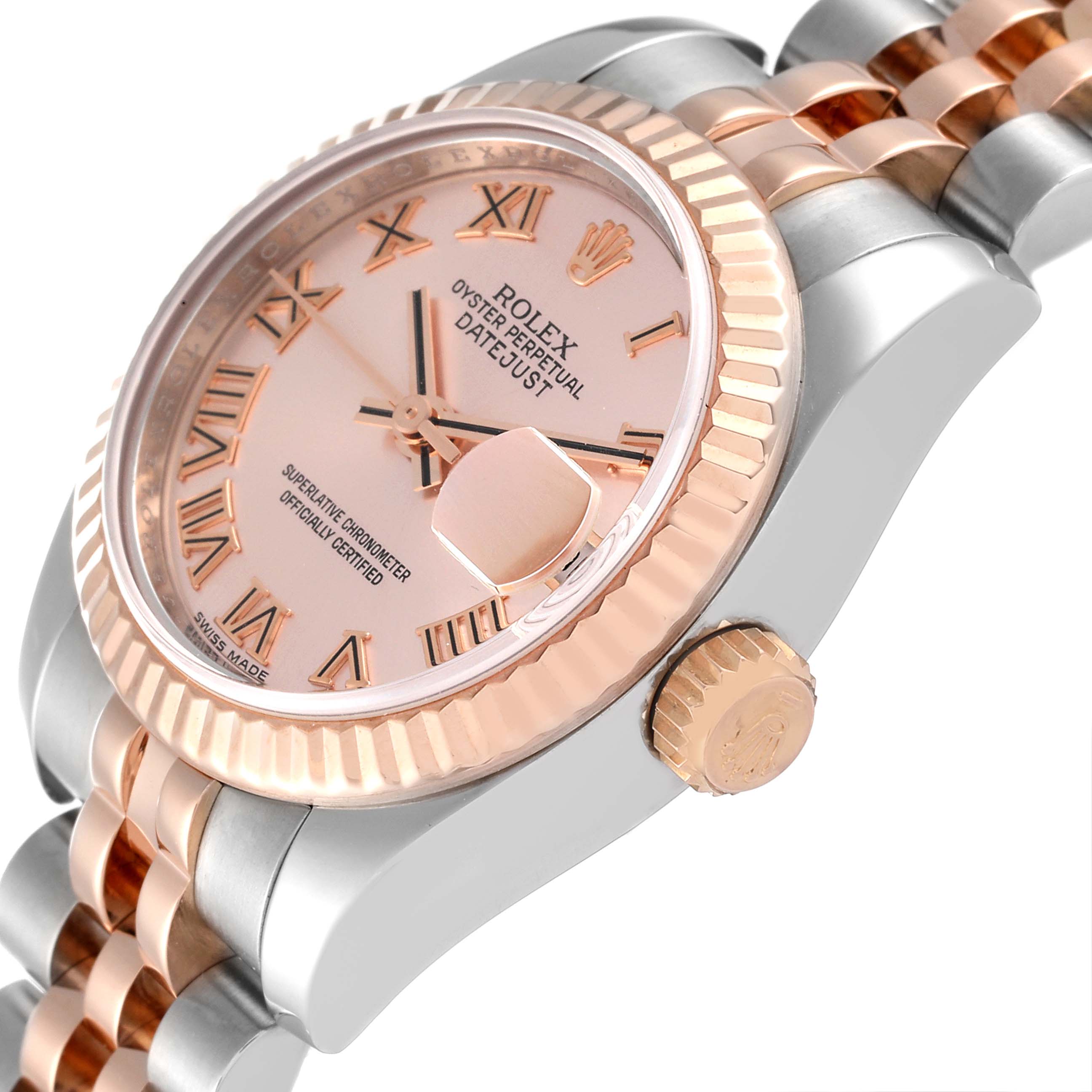 The image shows a Rolex Datejust 179171 Women's Steel and Gold (two tone) Pink Dial 179171 Women's Steel and Gold (two tone) Pink Dial watch from a close-up angle, focusing on its dial, bezel, crown, and part of the bracelet.