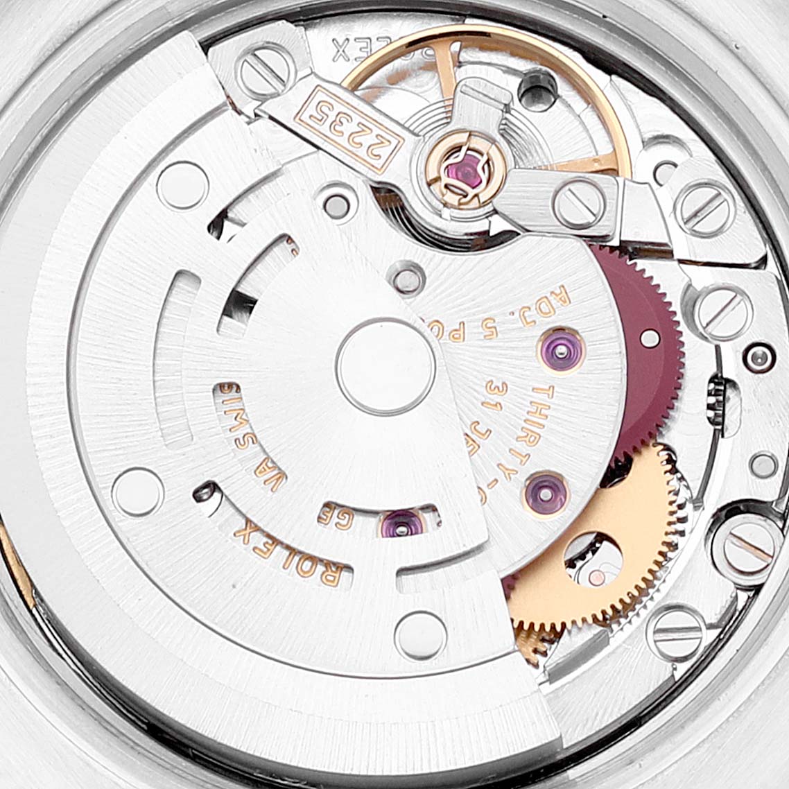 The image shows a close-up of the Rolex Datejust 179171 Women's Steel and Gold (two tone) Pink Dial 179171 Women's Steel and Gold (two tone) Pink Dial watch movement, detailing the mechanical components.