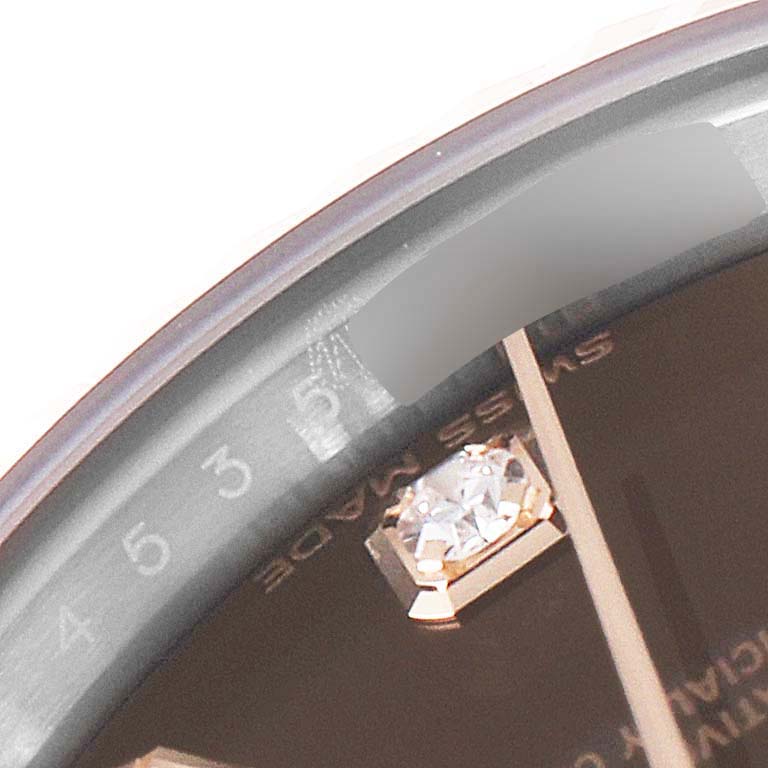 This image shows a close-up of the face and dial of a Rolex Datejust 279171 Women's Steel and Gold (two tone) Brown Dial 279171 Women's Steel and Gold (two tone) Brown Dial watch, highlighting the diamond hour marker and part of the minute track.