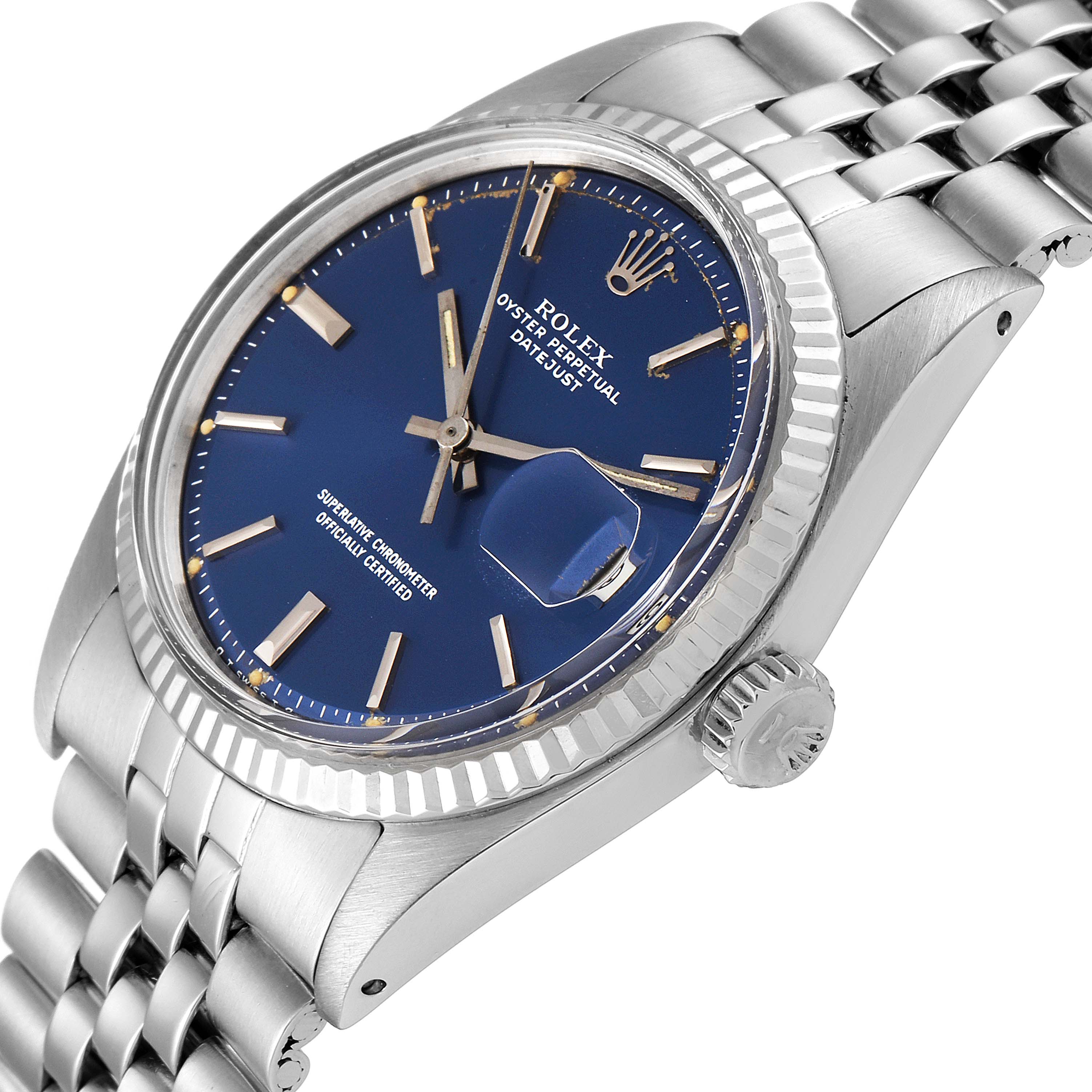 The image shows a Rolex Vintage Collection 1601 Men's Stainless Steel Blue Dial 1601 Men's Stainless Steel Blue Dial watch with a blue dial, magnified date display, and stainless steel bracelet from an oblique angle.