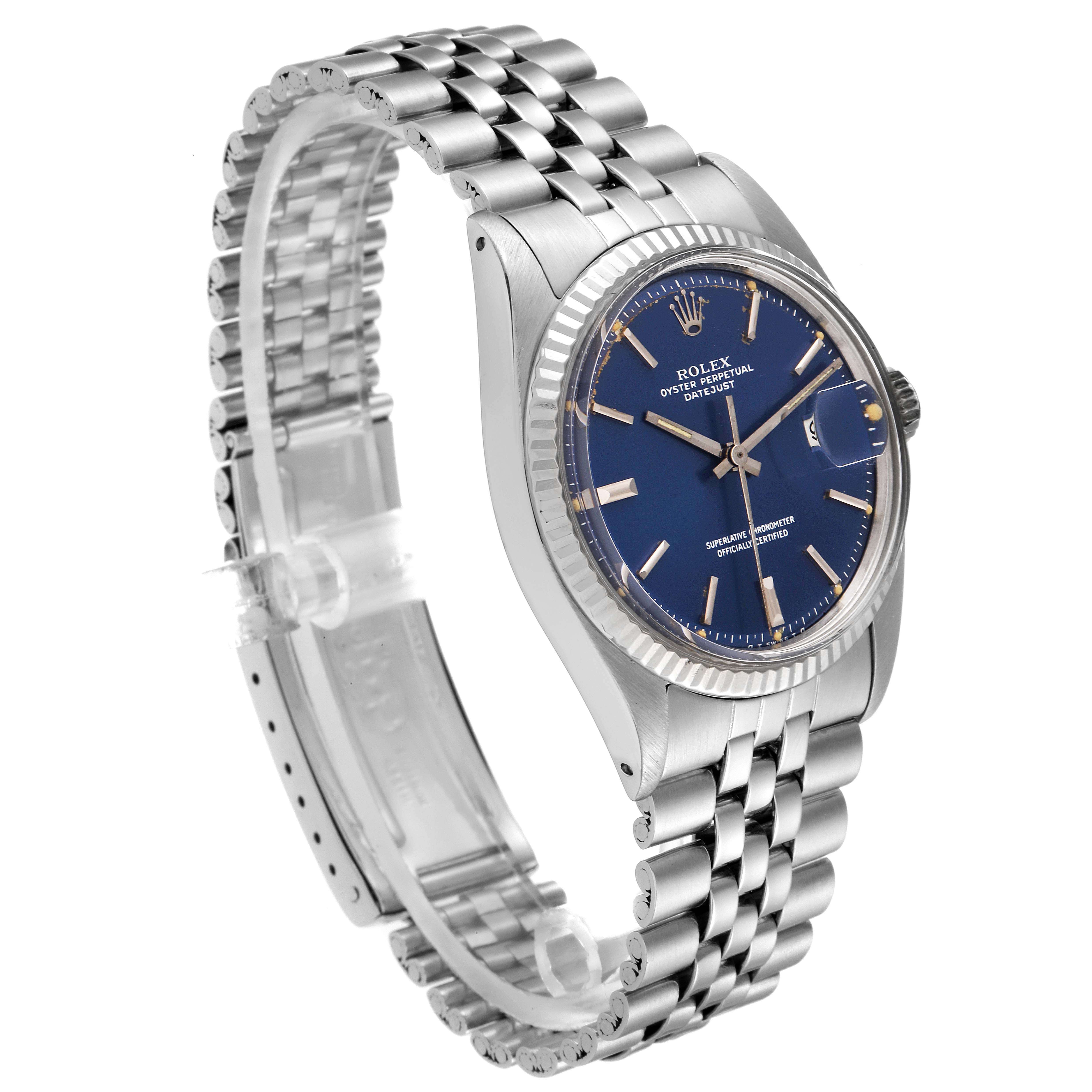 The Rolex Vintage Collection 1601 Men's Stainless Steel Blue Dial 1601 Men's Stainless Steel Blue Dial model watch is shown at an angled side view, featuring the clasp, bracelet, and dial.