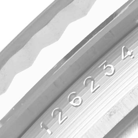 This close-up image shows the inner case ring and part of the fluted bezel of the Rolex Datejust 126234 Men's Stainless Steel Purple Dial 126234 Men's Stainless Steel Purple Dial.