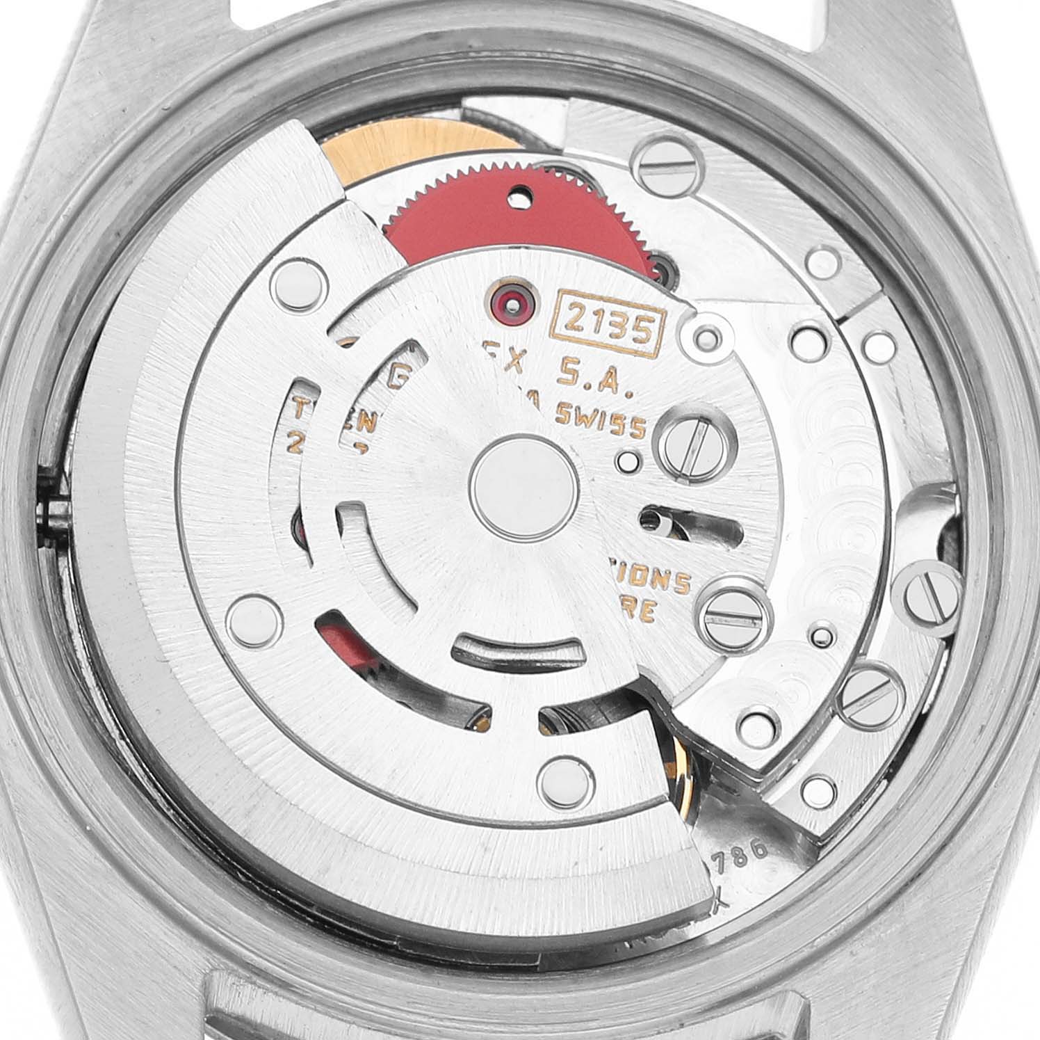 The image shows a close-up of the Rolex Datejust 69174 Women's Stainless Steel Silver Dial movement from the back, highlighting gears and mechanical components.