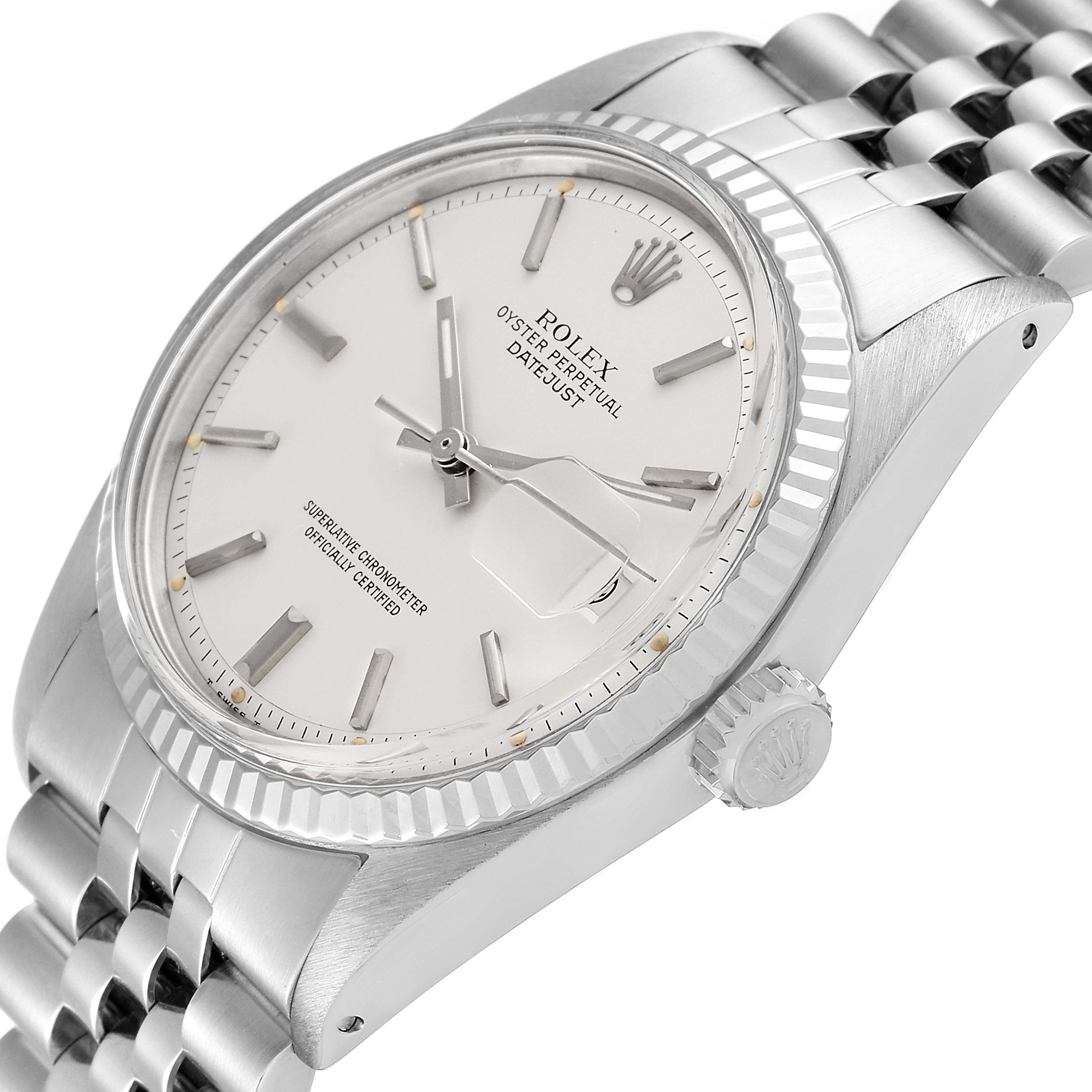 The image shows a side angle of the Rolex Vintage Collection 1601 Men's Stainless Steel Silver Dial 1601 Men's Stainless Steel Silver Dial watch, featuring the dial, bezel, crown, and part of the bracelet.