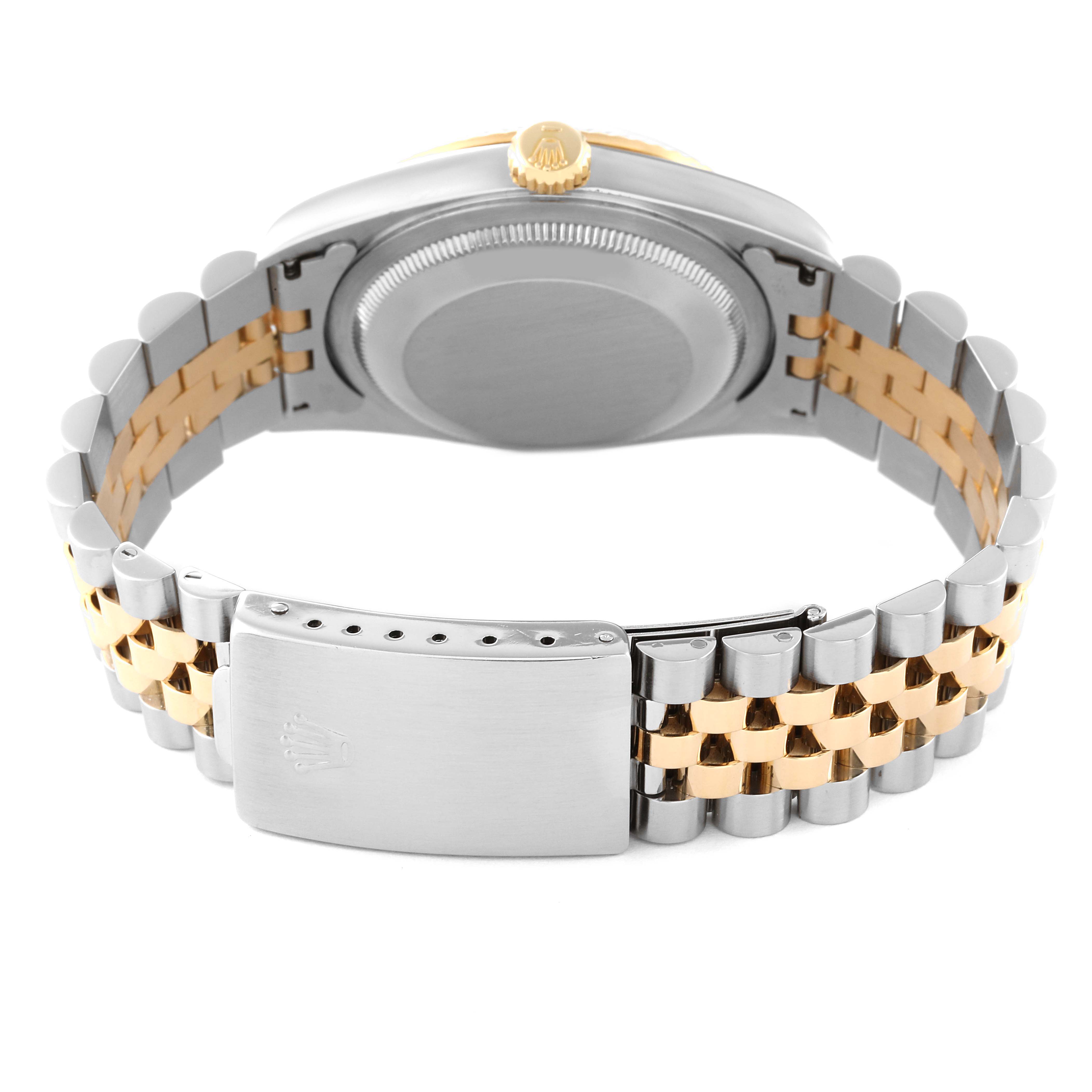 The image shows the back view of a Rolex Datejust 16233 Men's Steel and Gold (two tone) Champagne Dial 16233 Men's Steel and Gold (two tone) Champagne Dial watch, highlighting its case back, crown, and two-tone Jubilee bracelet with a clasp.