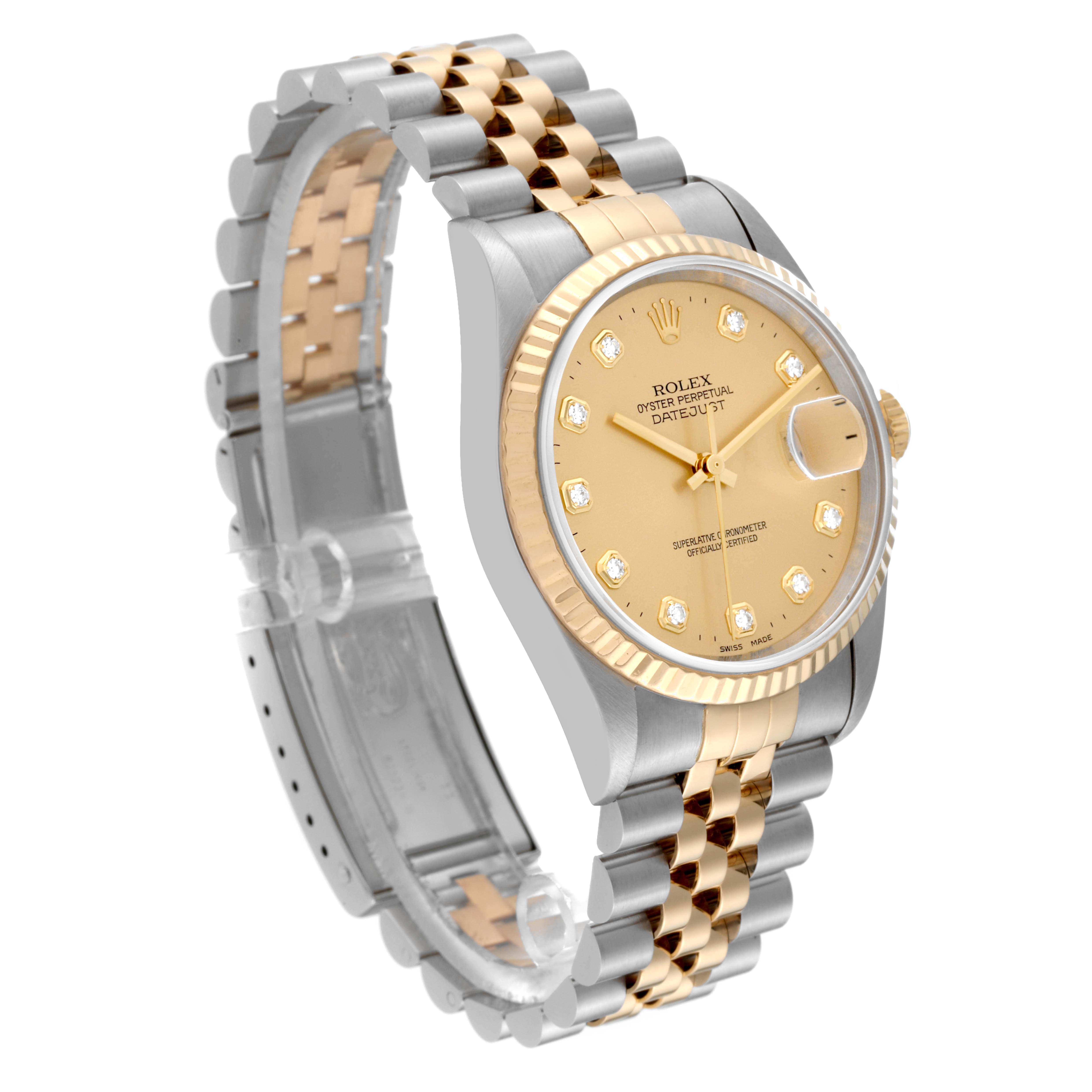 The image shows a Rolex Datejust 16233 Men's Steel and Gold (two tone) Champagne Dial 16233 Men's Steel and Gold (two tone) Champagne Dial watch angled to display the gold and silver bracelet, the fluted bezel, and the champagne dial.