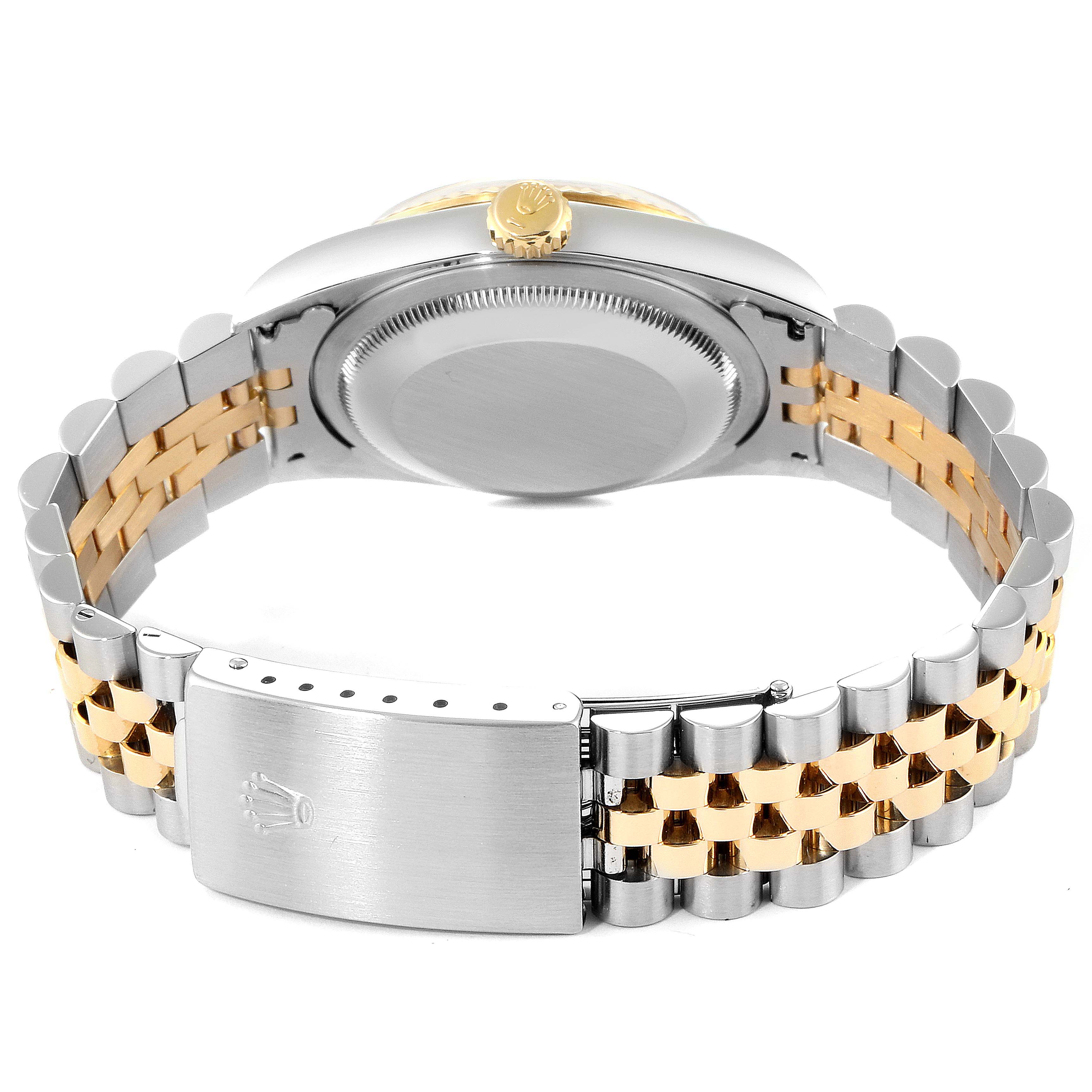 This image shows the back of a Rolex Datejust 16233 Men's Steel and Gold (two tone) Blue Dial 16233 Men's Steel and Gold (two tone) Blue Dial watch, including the case back, two-tone bracelet, and clasp.