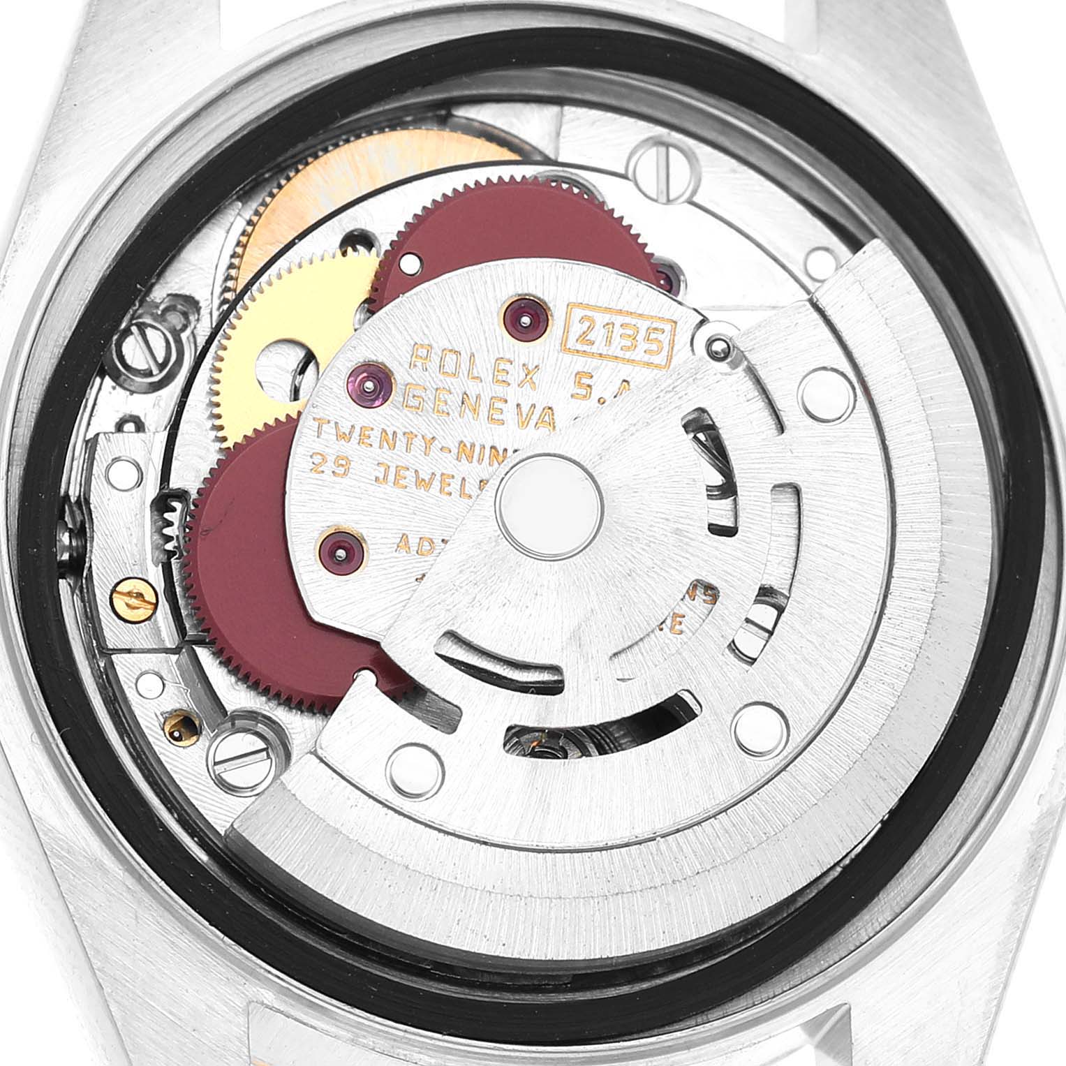 The image shows the inner mechanism of a Rolex Datejust 69173 Women's Steel and Gold (two tone) Silver Dial, focusing on its movement components from the back.