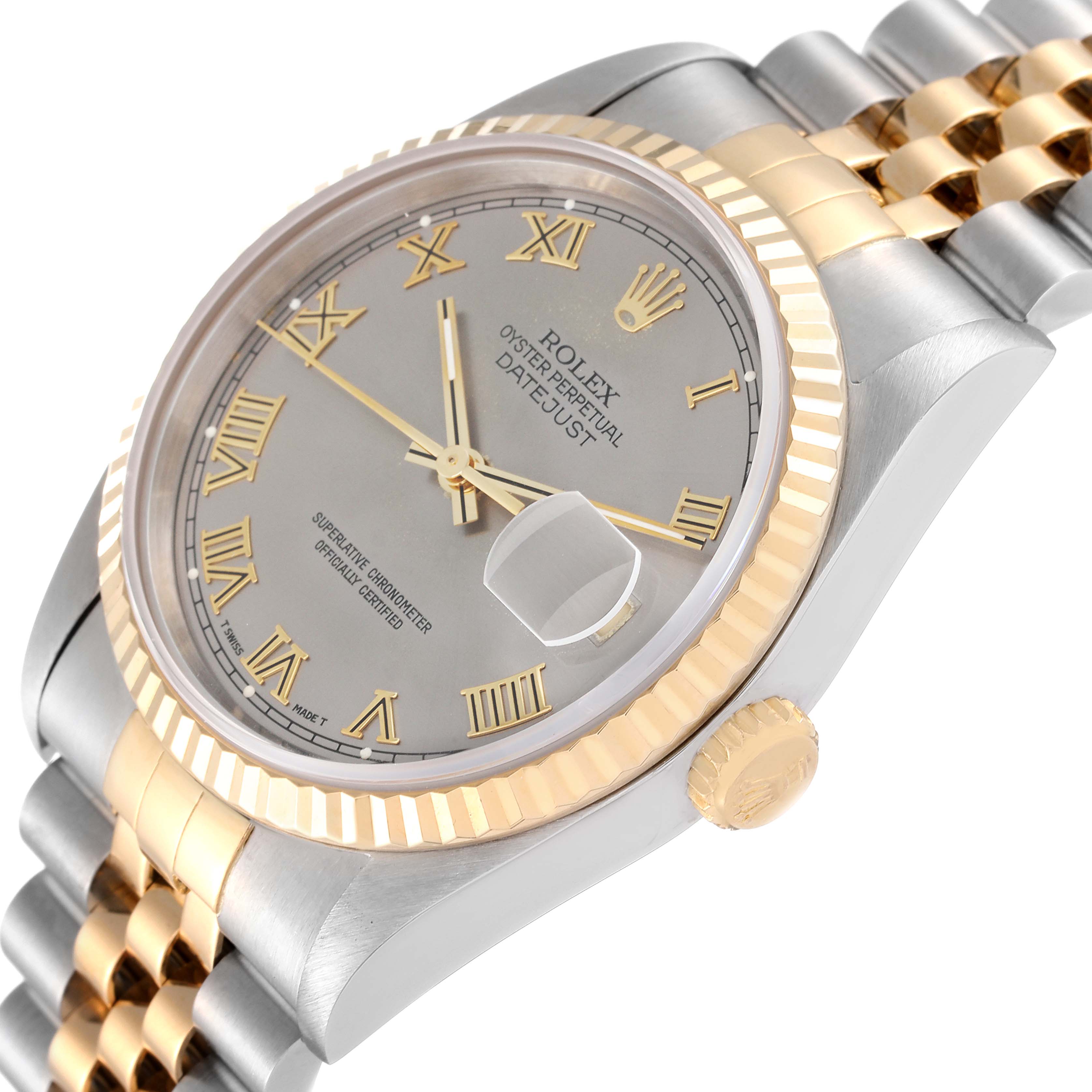 The image shows a close-up angle of the Rolex Datejust 16233 Men
s Steel and Gold (two tone) Grey Dial 16233 Men
s Steel and Gold (two tone) Grey Dial watch
s face, bezel, and part of the bracelet.