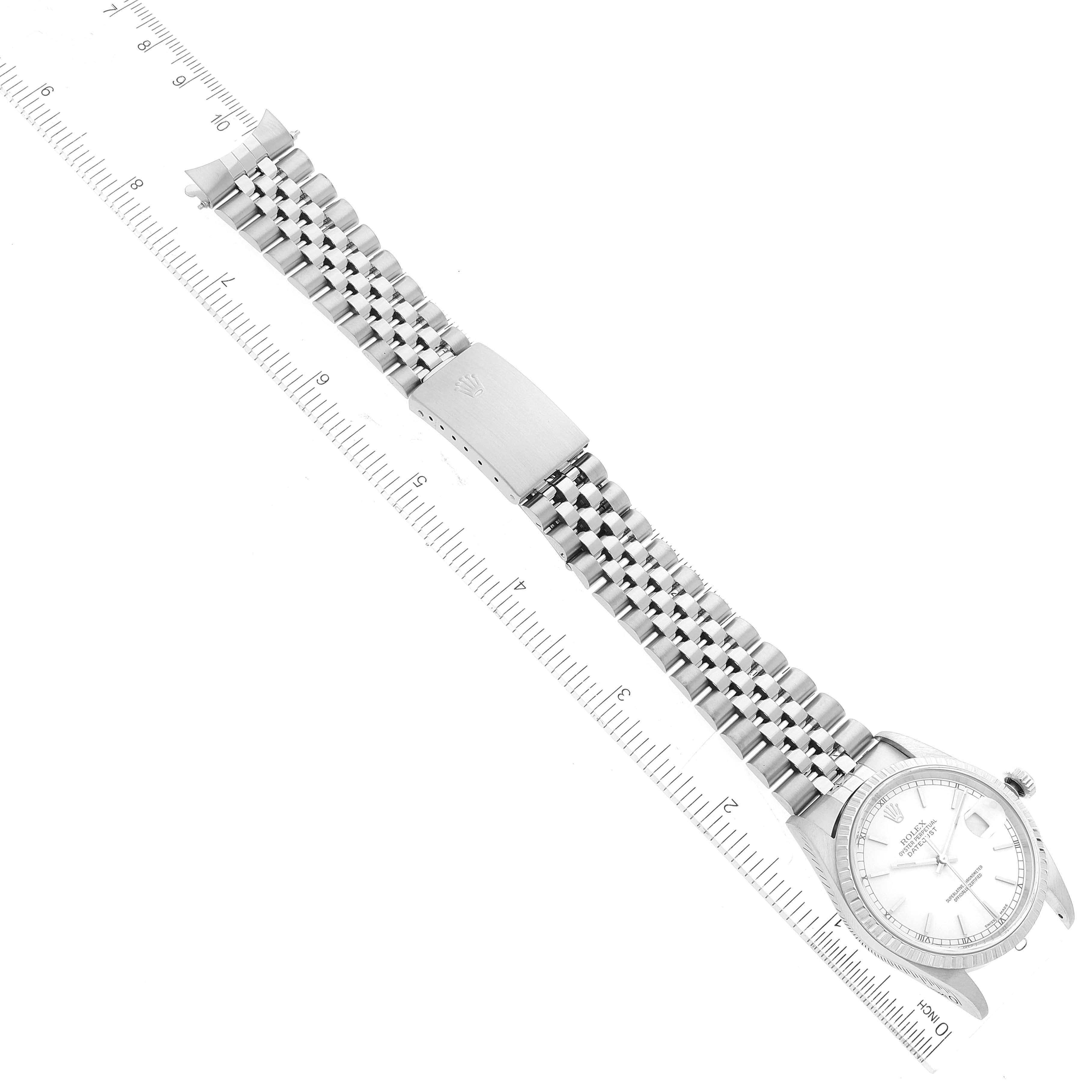 The Rolex Datejust 16220 Men's Stainless Steel White Dial 16220 Men's Stainless Steel White Dial is shown from a top-down angle, displaying the full bracelet, clasp, and watch face.