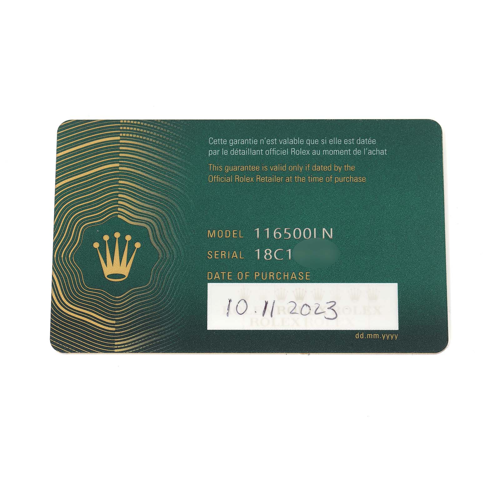 This image shows a Rolex Daytona 116500 Men
s Stainless Steel White Dial warranty card with model and serial numbers and purchase date.