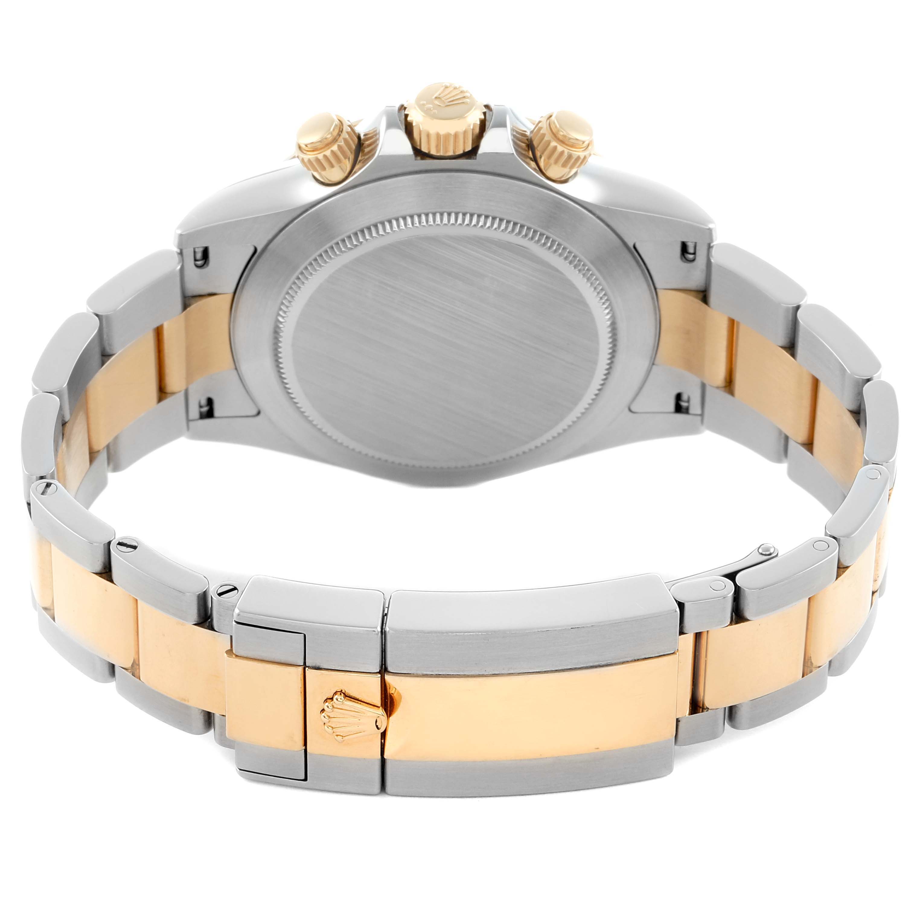 The Rolex Daytona 116503 Men
s Steel and Gold (two tone) Mother of Pearl Dial watch is shown from the back, highlighting the case back, crown, pushers, and two-tone bracelet.