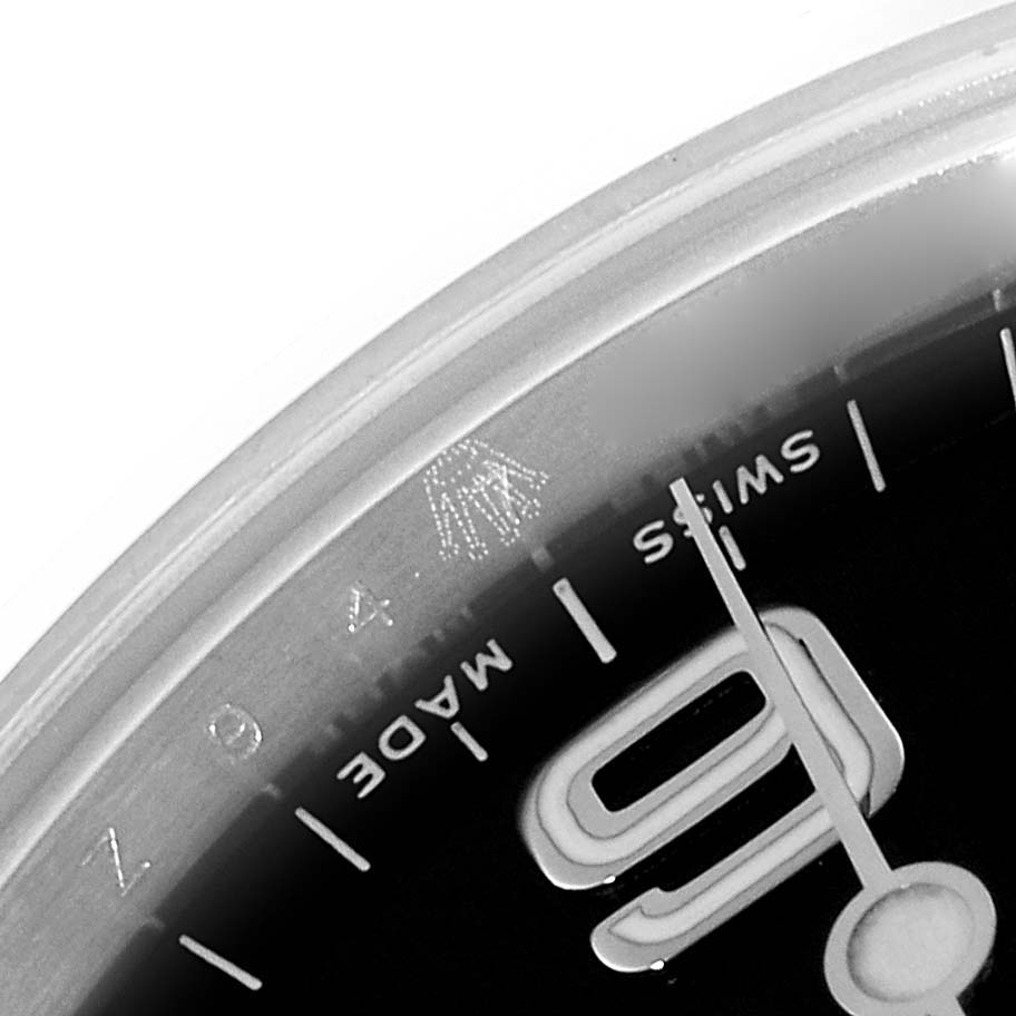 The image shows a close-up of the dial, hands, and "Swiss Made" text on a Rolex Explorer 114270 Men's Stainless Steel Black Dial 114270 Men's Stainless Steel Black Dial watch.
