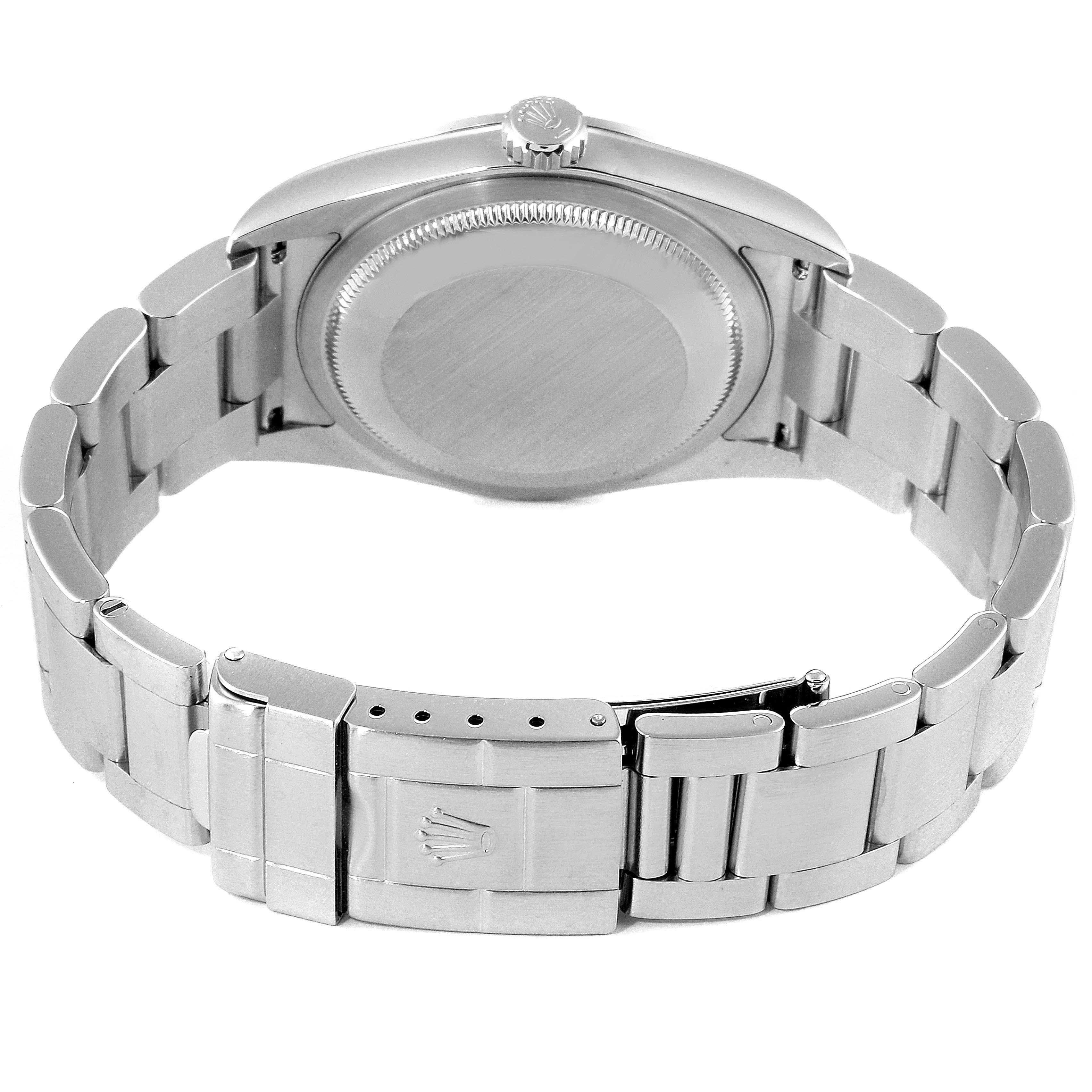 This image shows a rear angle of a Rolex Explorer 114270 Men
s Stainless Steel Black Dial 114270 Men
s Stainless Steel Black Dial watch, focusing on the case back and bracelet.