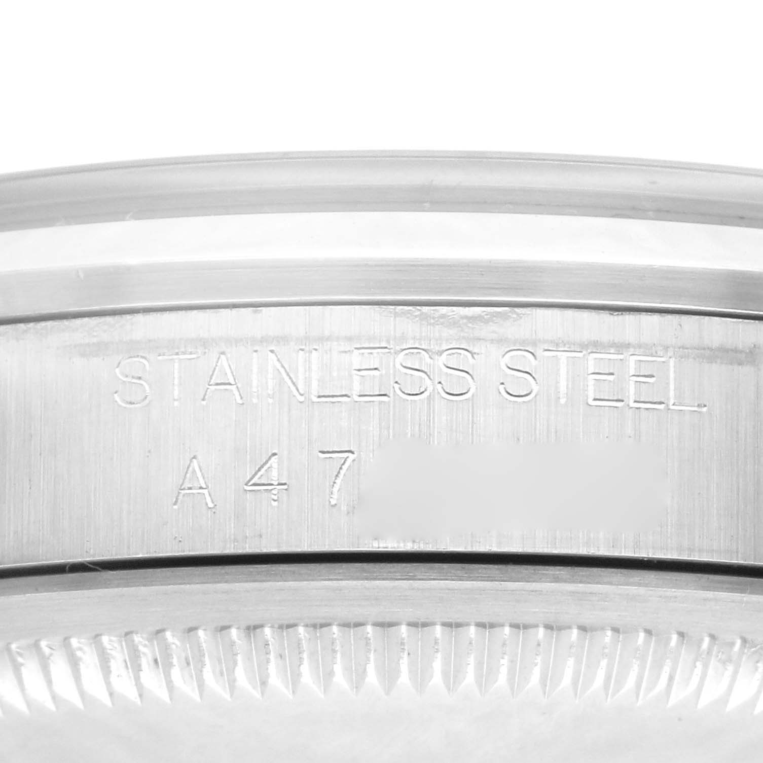 This image shows a detailed close-up of the stainless steel casing with engraved text of the Rolex Explorer 14270 Men
s Stainless Steel Black Dial 14270 Men
s Stainless Steel Black Dial watch.