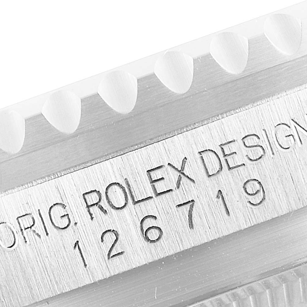 This image shows the model number engraved on the side of the case of a Rolex GMT-Master 126719 Men's White Gold Blue Dial 126719 Men's White Gold Blue Dial watch.