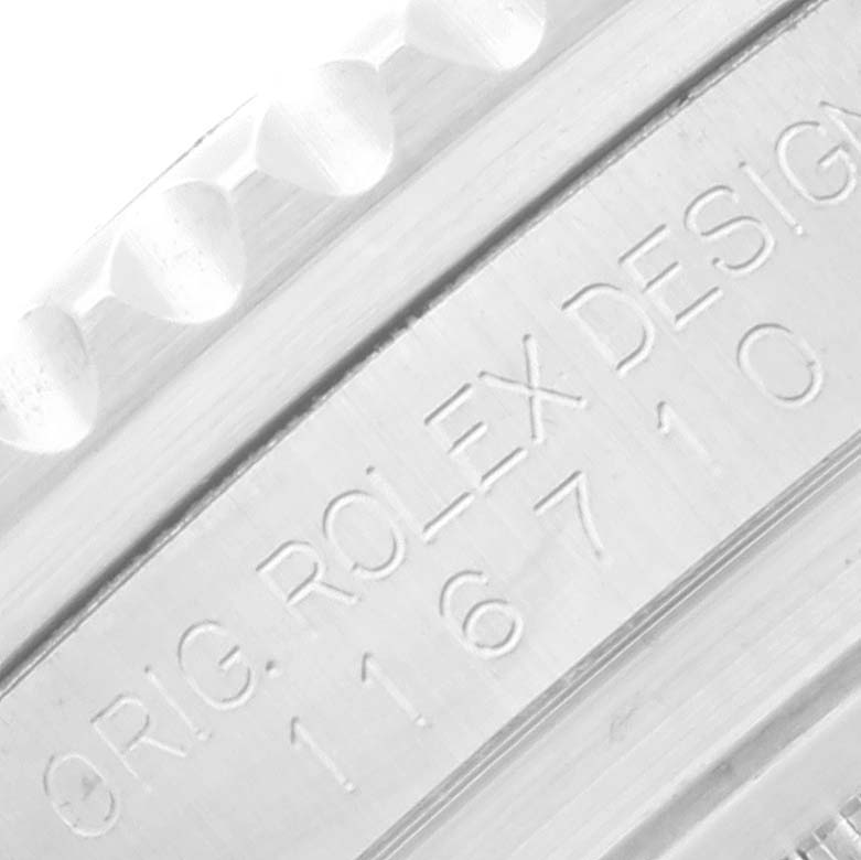 This close-up image shows the engraved model number on the side of the case of the Rolex GMT-Master 116710 Men
s Stainless Steel Black Dial 116710 Men
s Stainless Steel Black Dial watch.