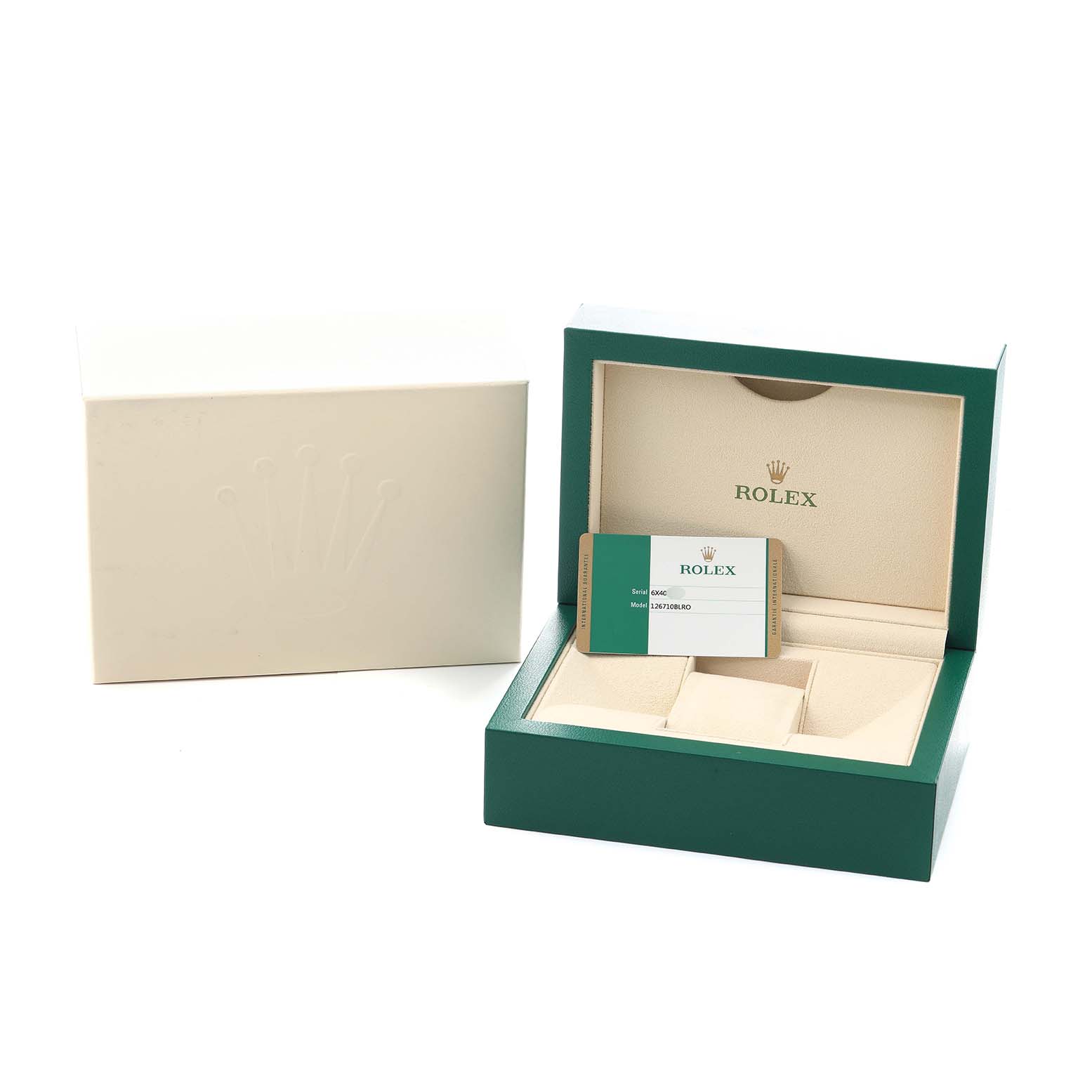 The image shows the open box of a Rolex GMT-Master 126710 Men
s Stainless Steel Black Dial, with its packaging and card visible.