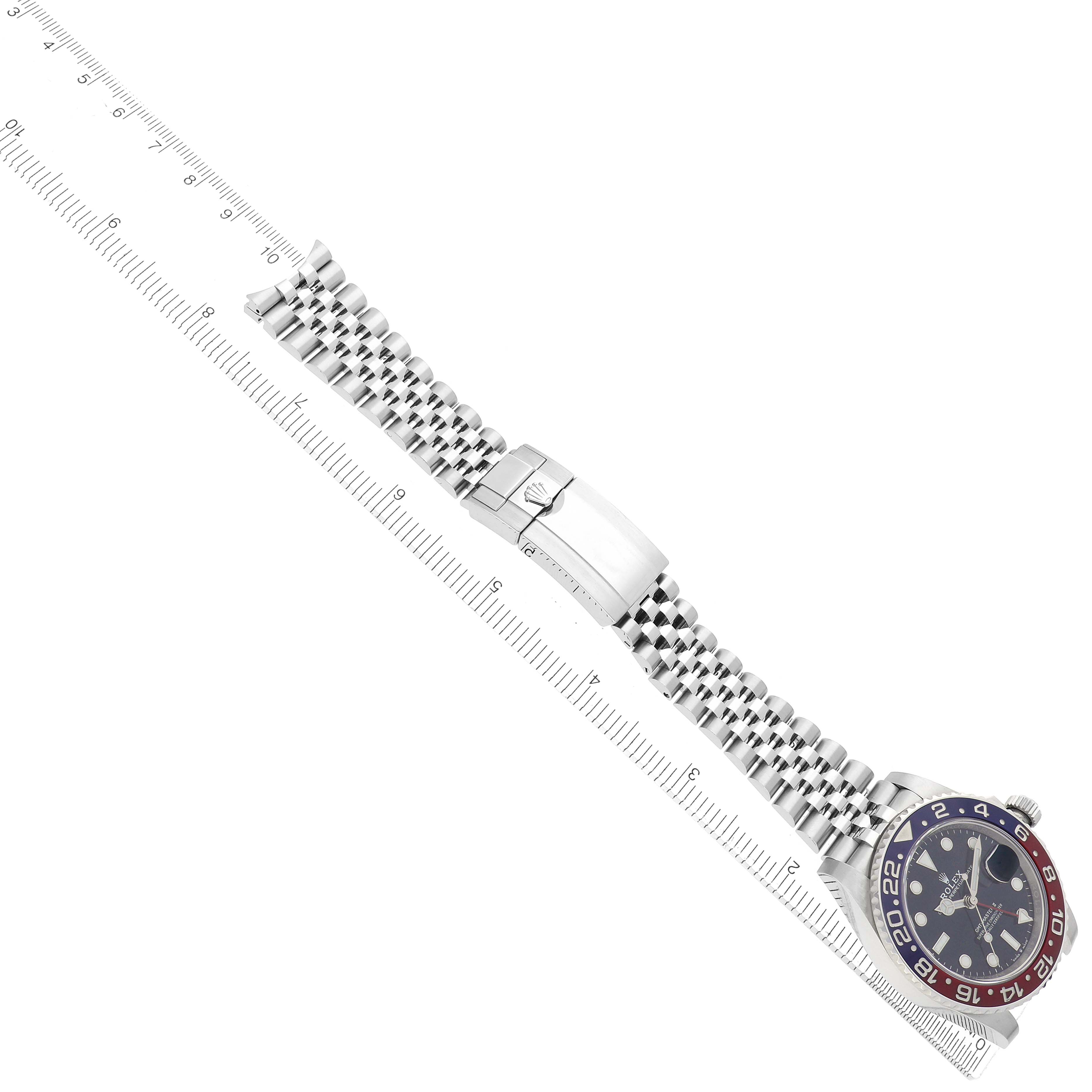 The Rolex GMT-Master 126710 Men
s Stainless Steel Black Dial watch is shown at a diagonal angle, featuring the bezel, dial, and bracelet clasp.
